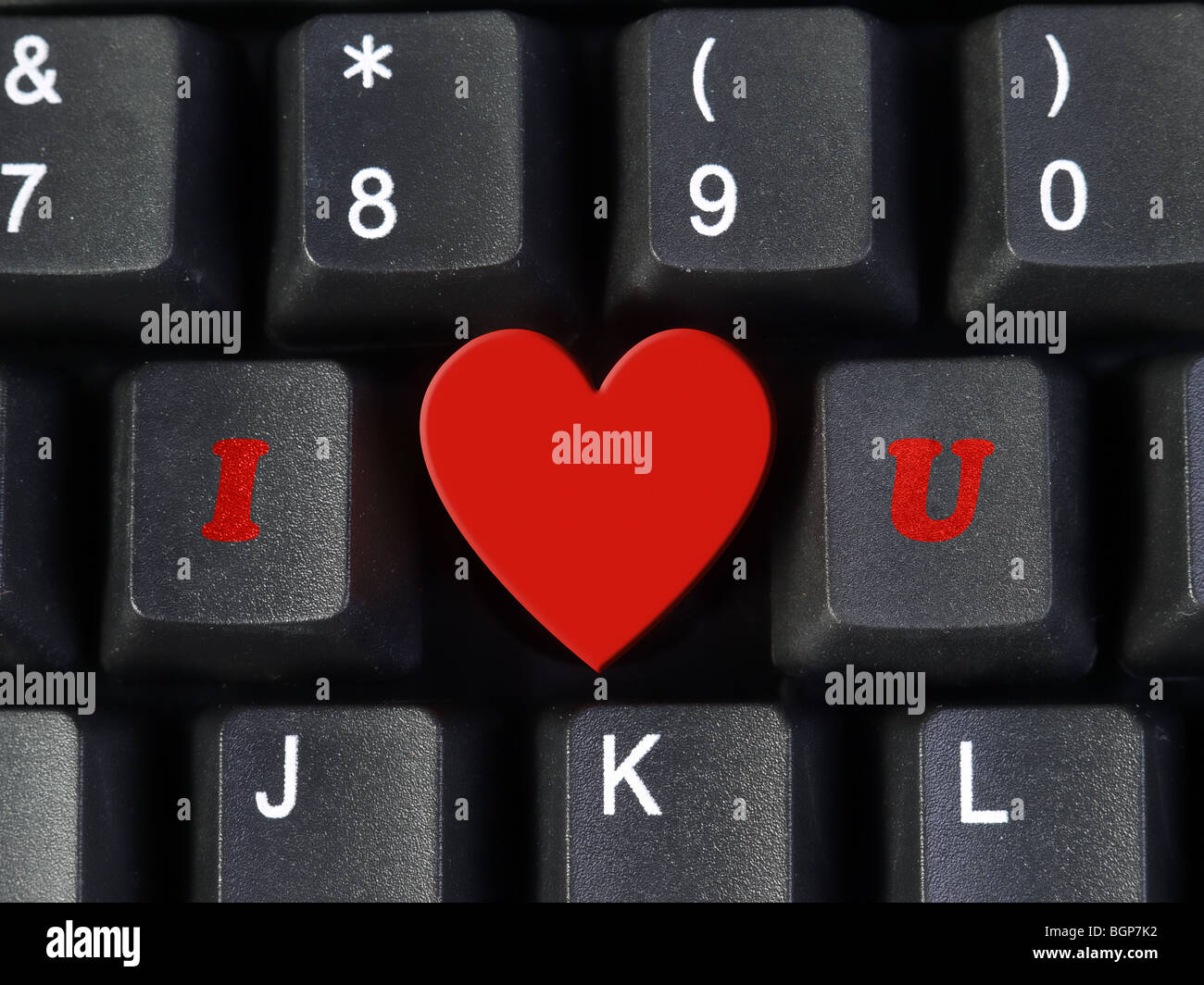 Ti Amo acronimo disposti dal computer i tasti della tastiera I e U con forma di cuore che rappresenta la parola amore Foto Stock