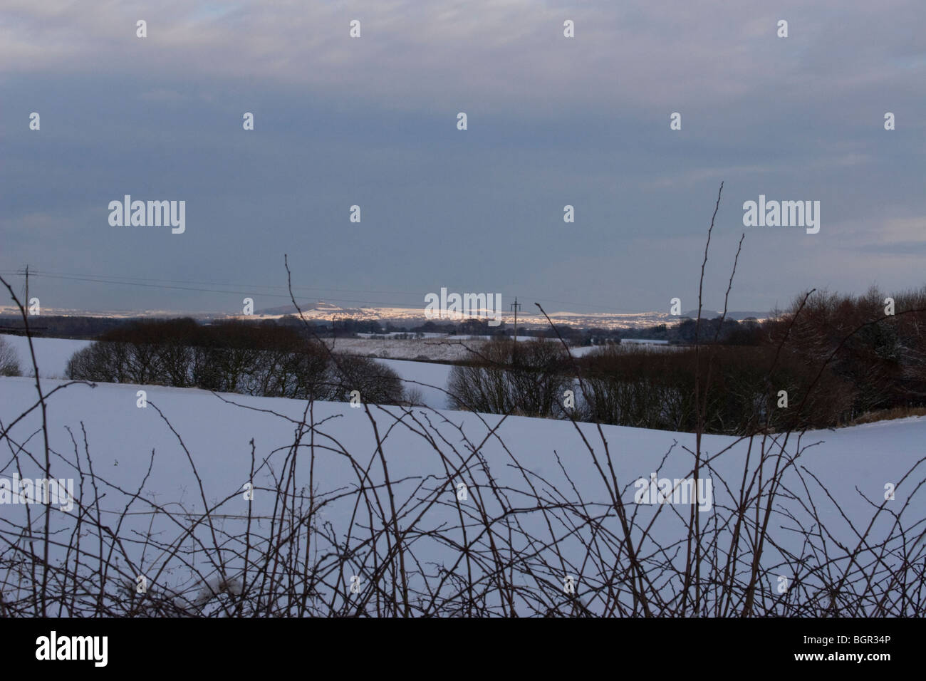 Scena di neve al tramonto Foto Stock