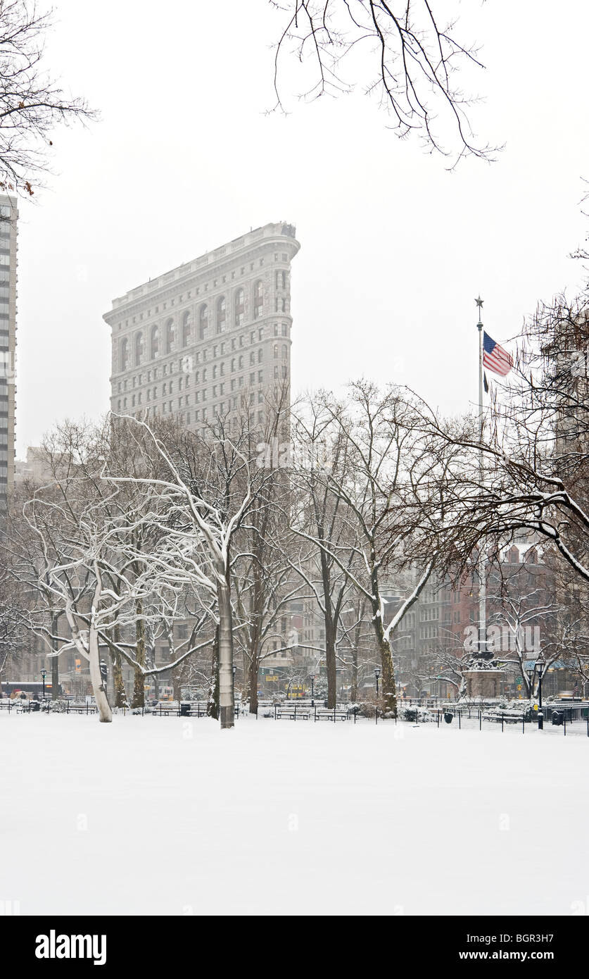 Flatiron Building Madison Square Park inverno tempesta di neve Foto Stock
