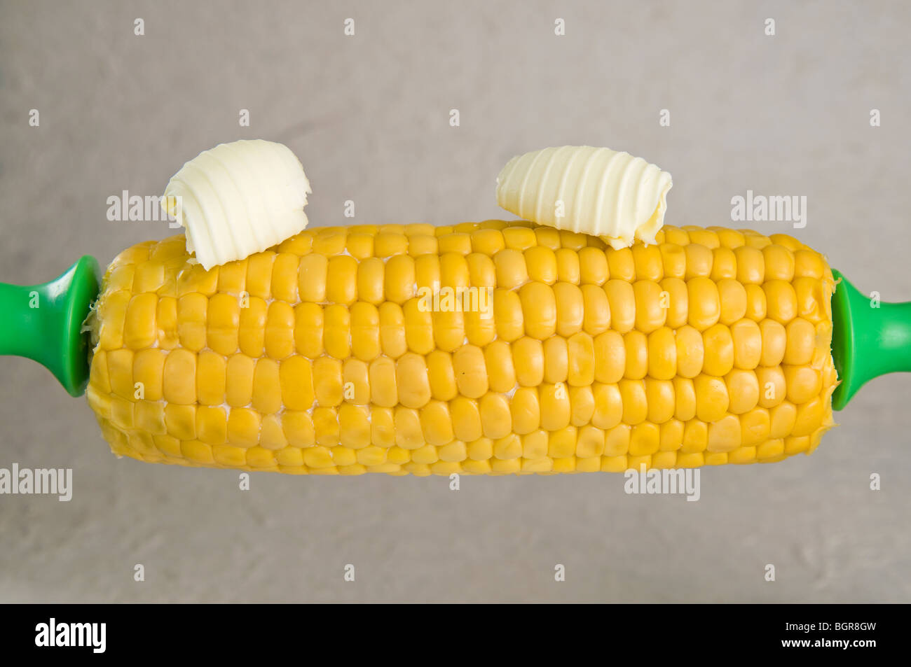 Fresco imburrato sulla pannocchia di mais Foto Stock
