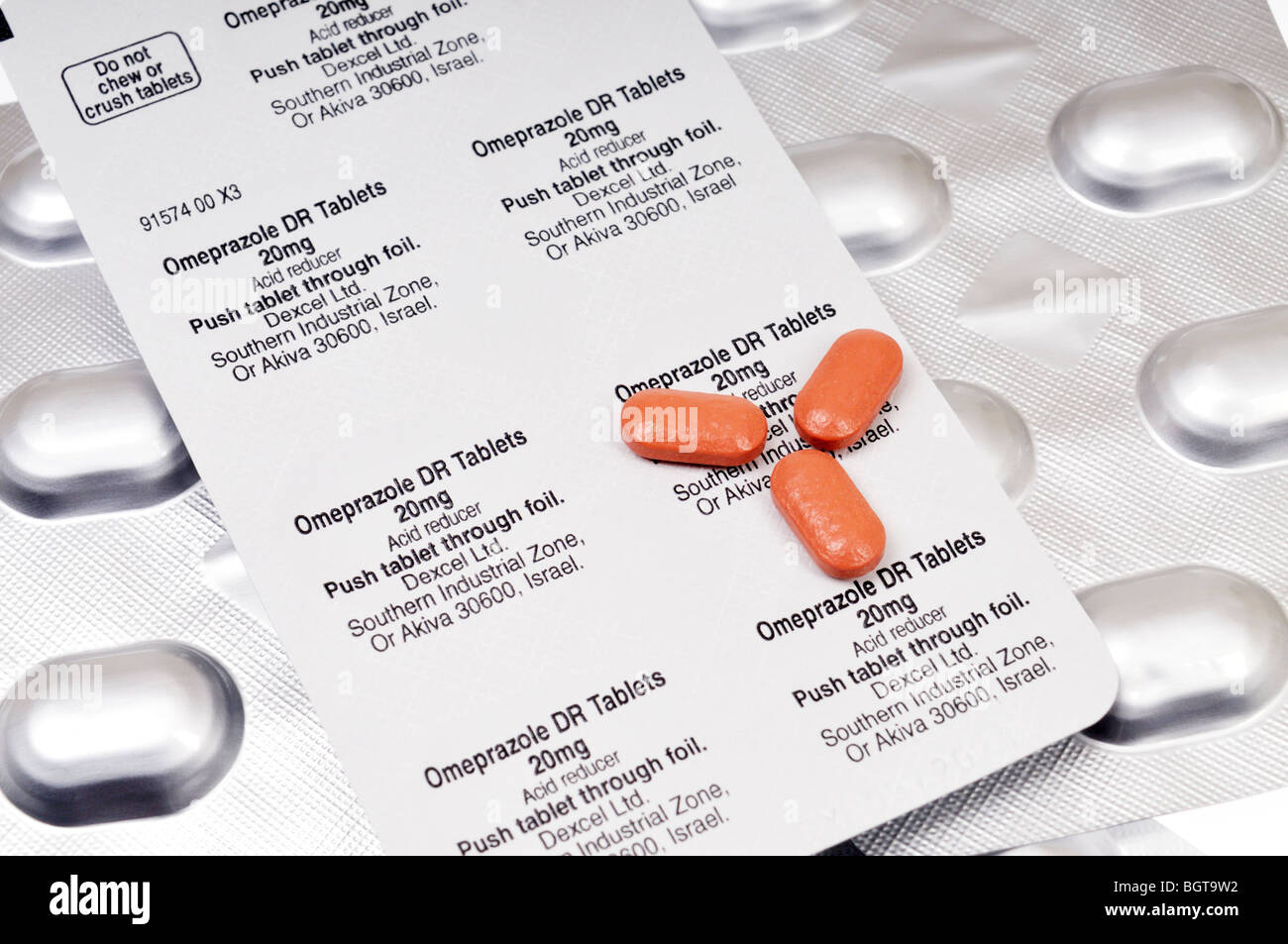 Compresse e blister di farmaci a base di omeprazolo Foto Stock