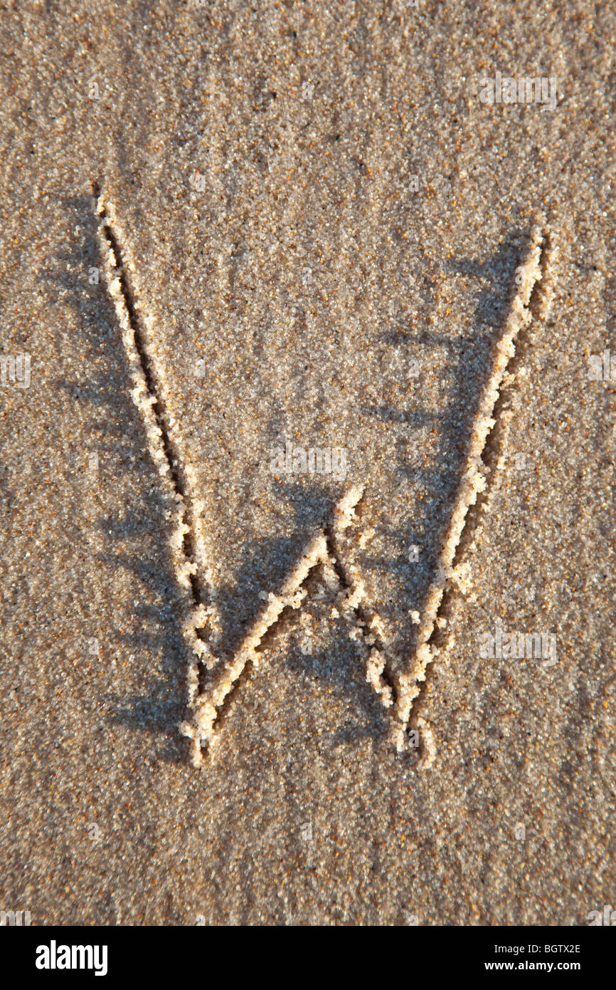 Lettera scritta in spiaggia Foto Stock