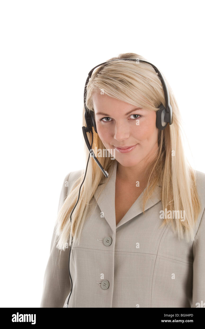 Ritratto di attraente segretario/operatore telefonico che indossa la cuffia isolati su sfondo bianco Foto Stock