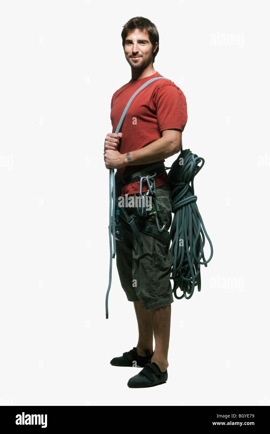 Ritratto di uomo con ingranaggio di arrampicata Foto Stock