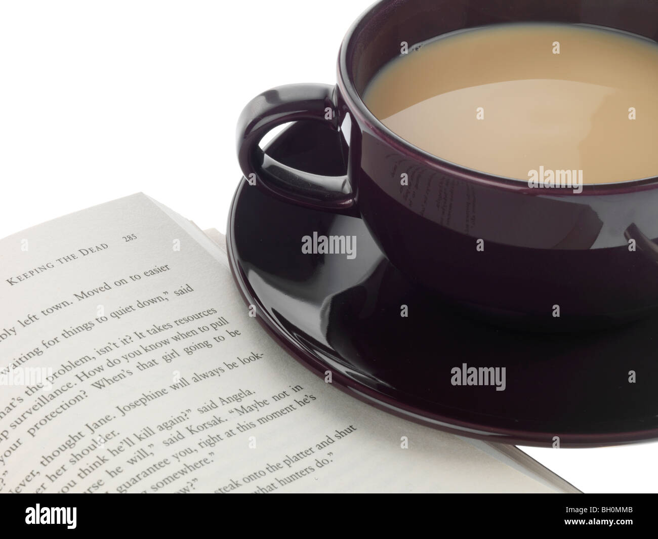 Tazza di tè con un libro Foto Stock