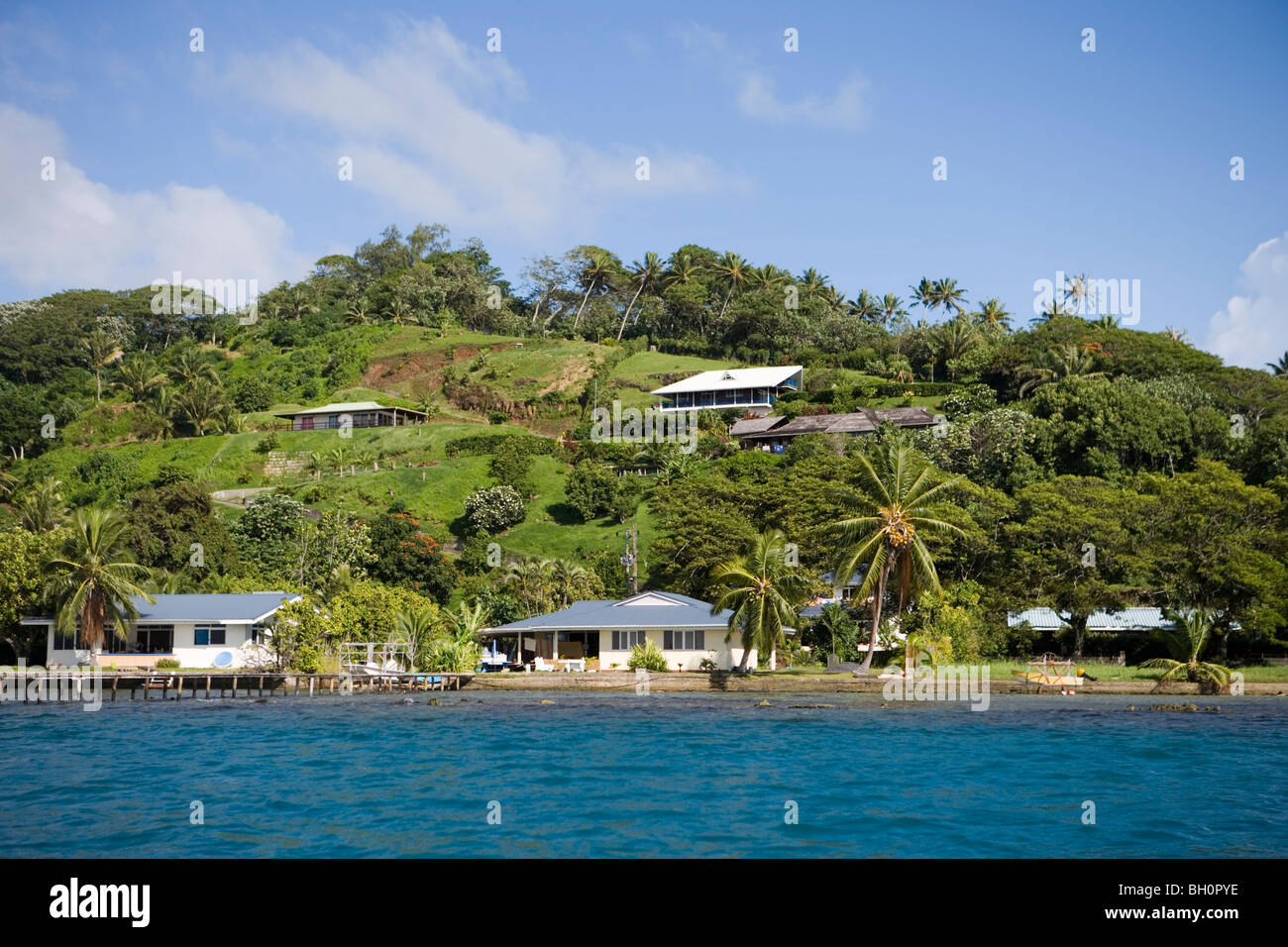 Case a Costa del Sole, Raiatea, Isole della Società, Polinesia francese, South Pacific Oceania Foto Stock