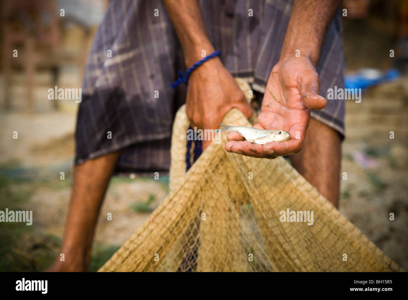 Fisherman con fermo in India Foto Stock