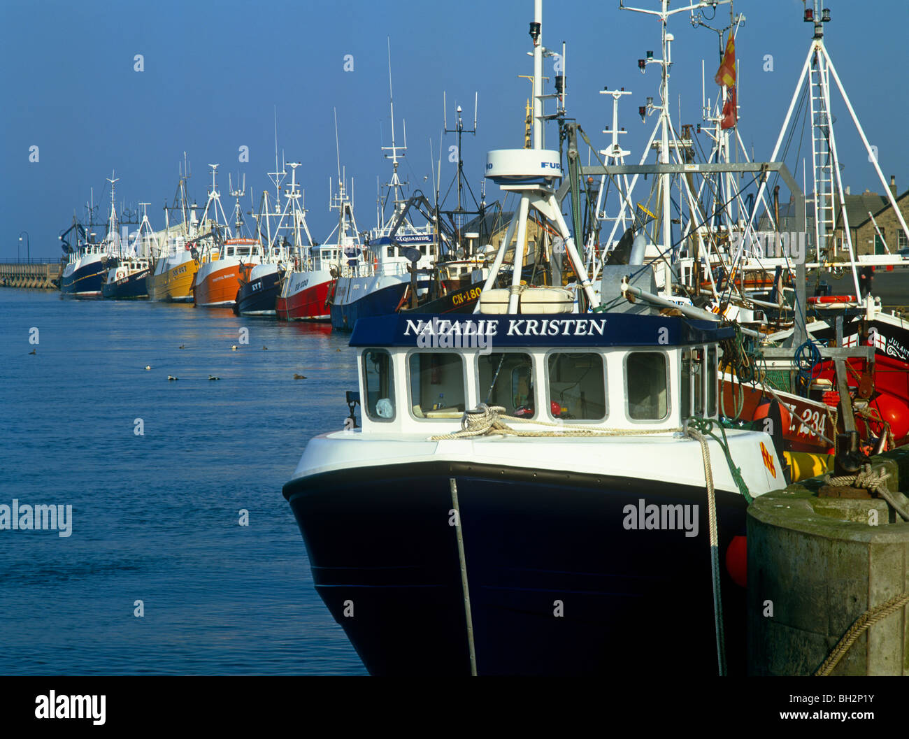 Una vista del porto di camminare in Northumberland con barche da pesca Foto Stock