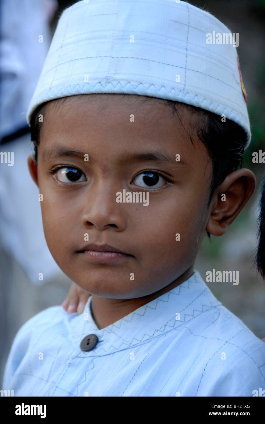 Ritratto di ragazzo musulmano in Kuta Bali, Indonesia. Foto Stock