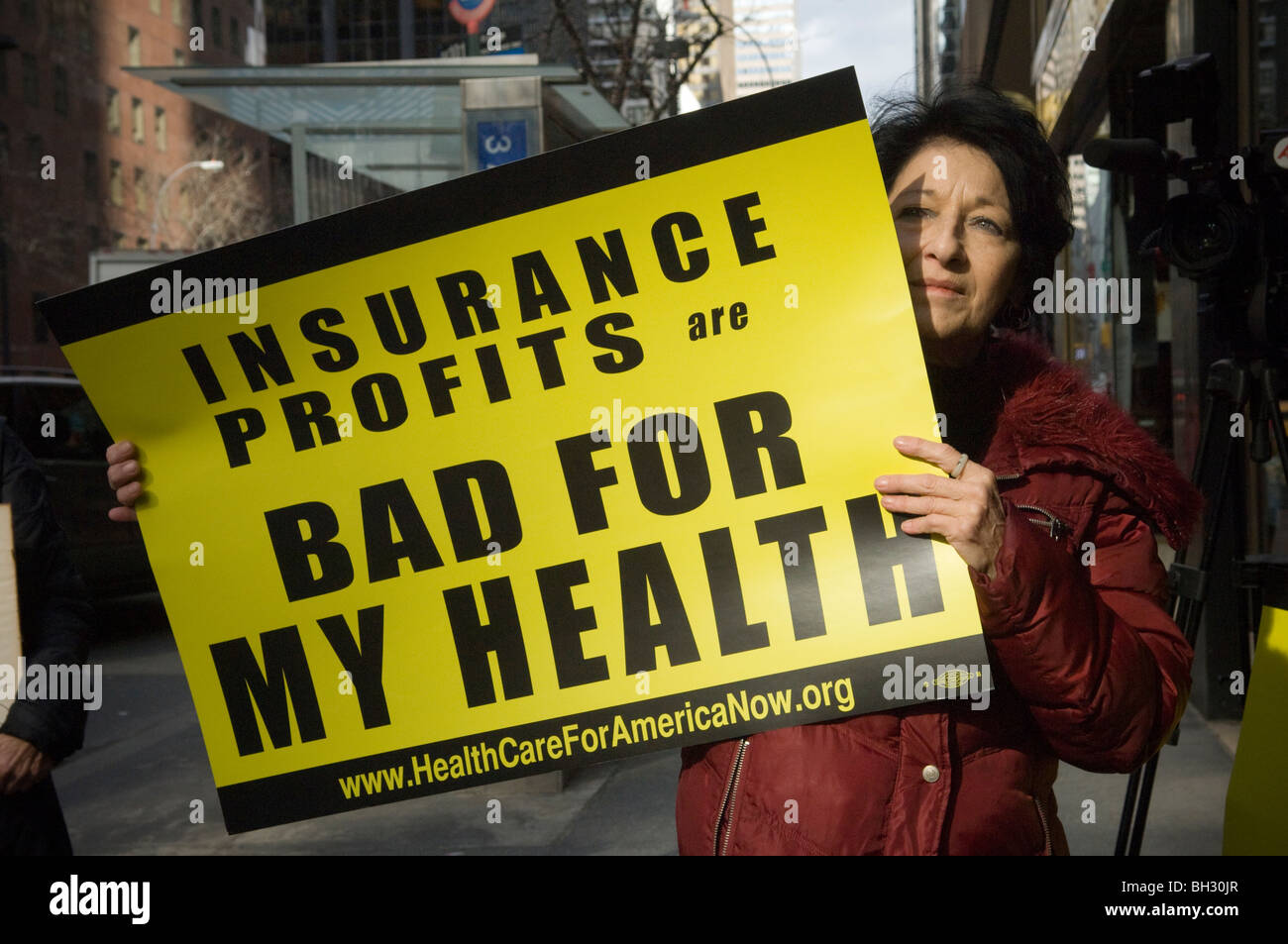 I cittadini interessati a New York chiamata su funzionari eletti per passare un piano di assistenza sanitaria Foto Stock