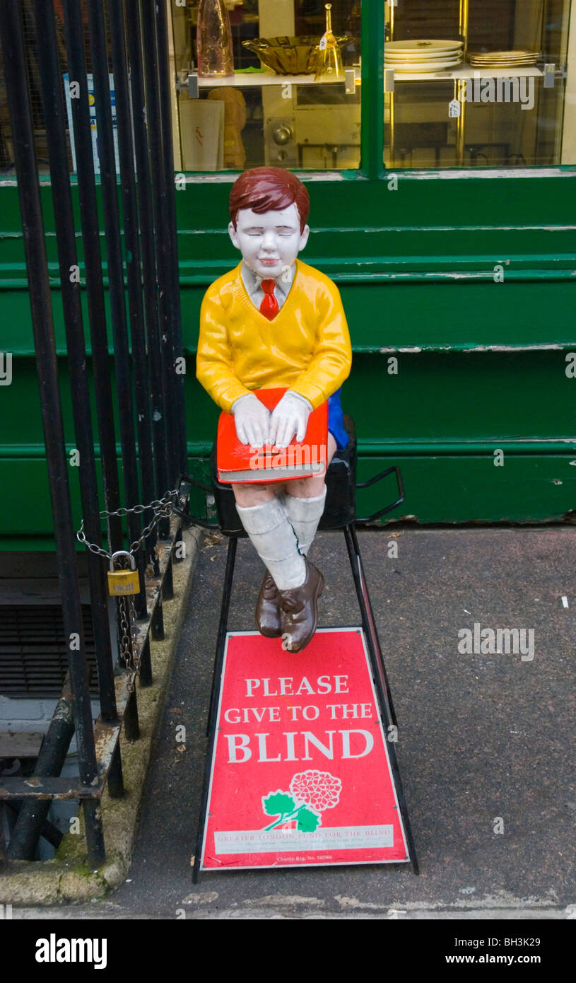 Charity box per il cieco centrale Marylebone Londra Inghilterra Regno Unito Europa Foto Stock