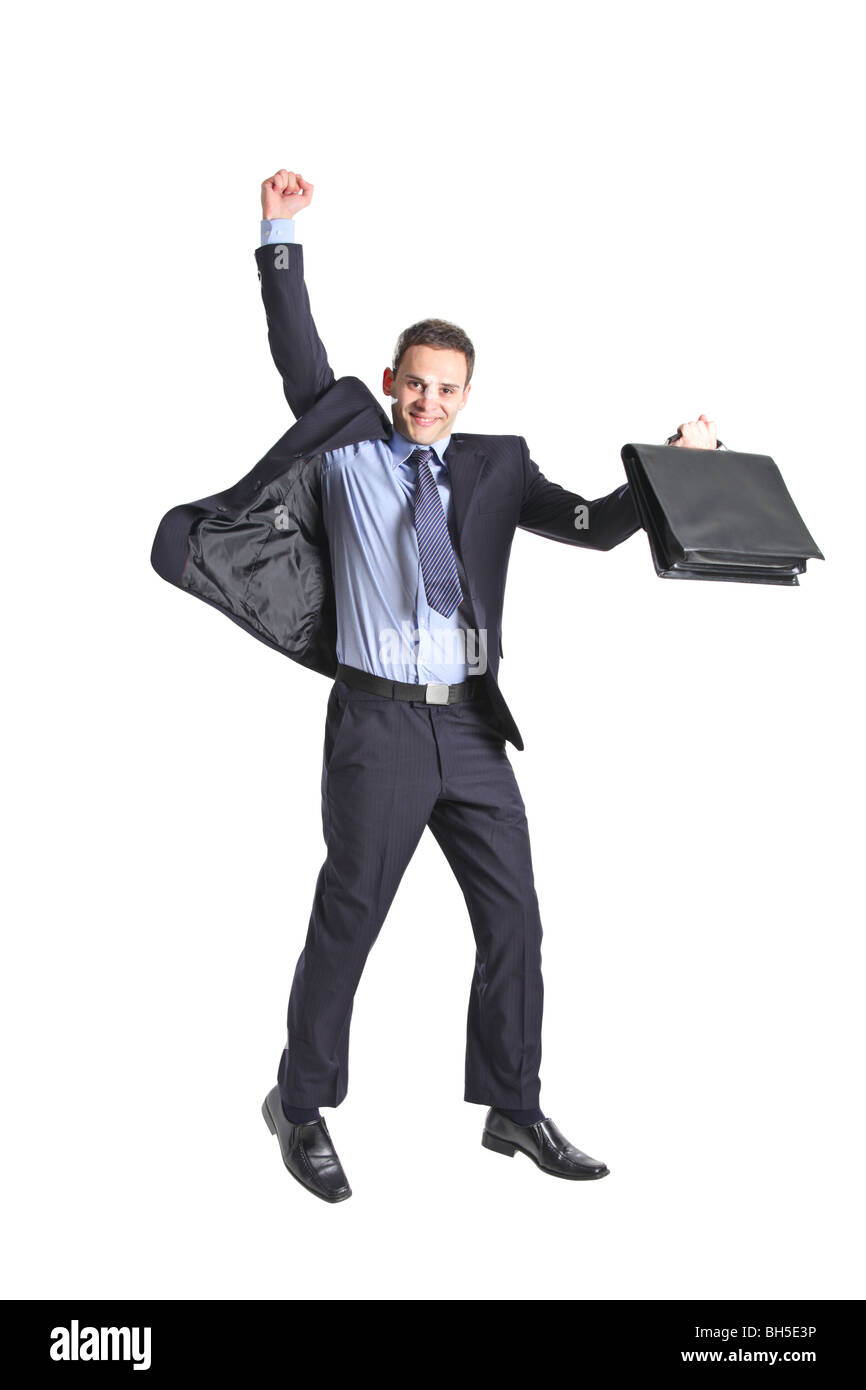 Un felice giovane imprenditore del salto in aria isolata su sfondo bianco Foto Stock