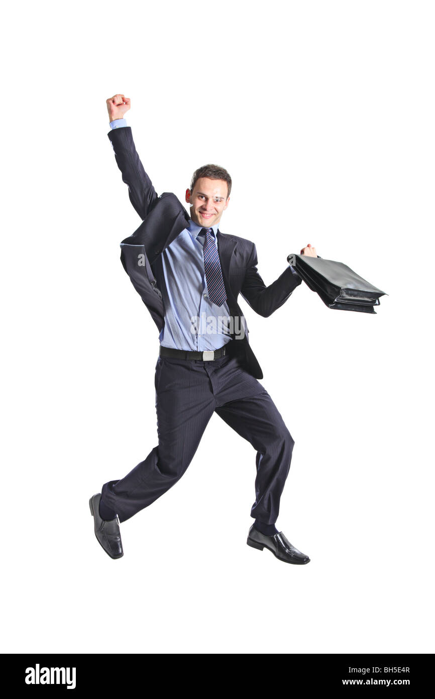 Un felice giovane imprenditore del salto in aria isolata su sfondo bianco Foto Stock