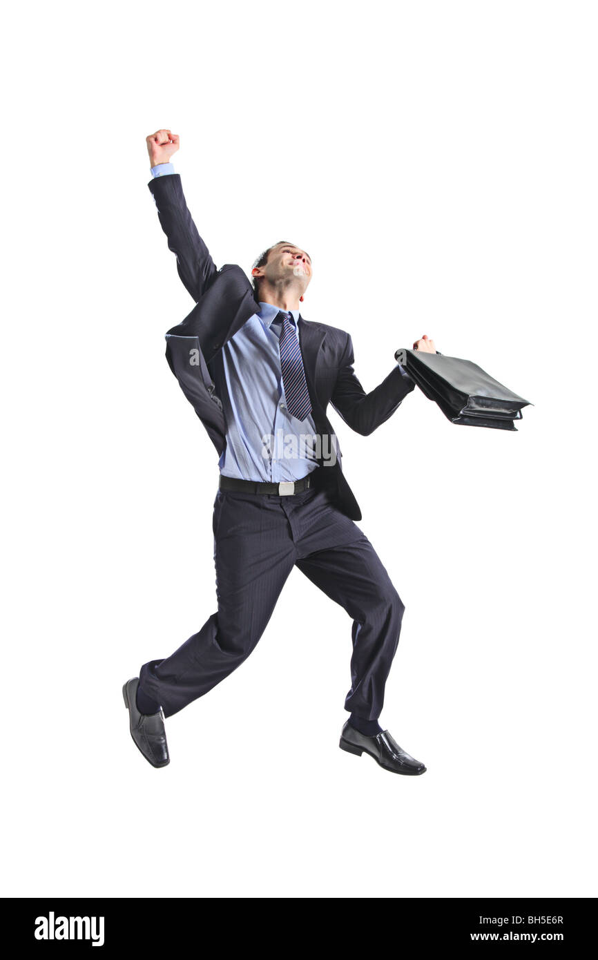 Un felice giovane imprenditore del salto in aria isolata su sfondo bianco Foto Stock