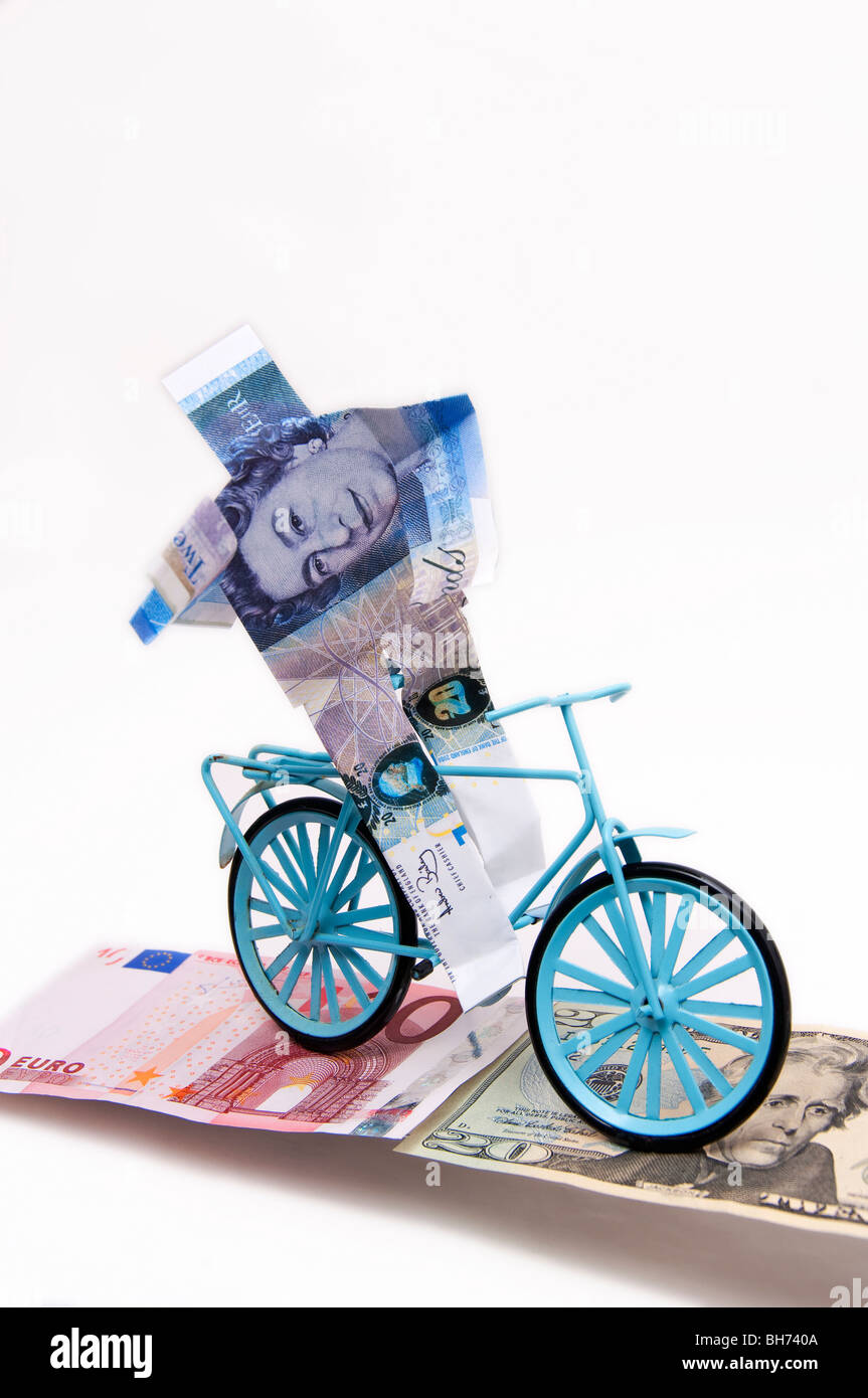 Concetto finanziario British pound riding bike felice moneta forte Foto Stock