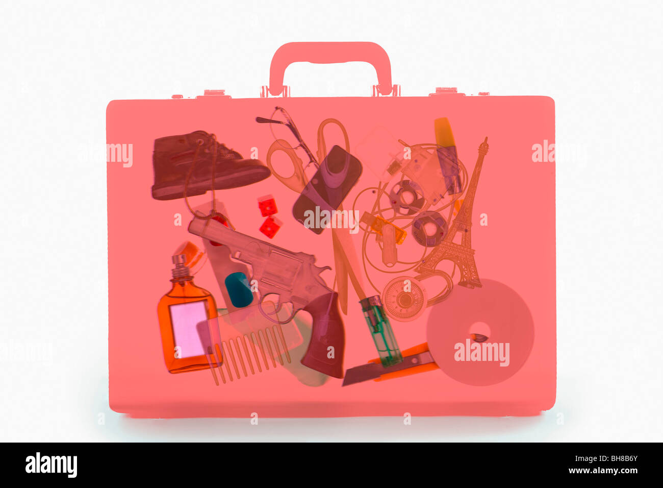 Immagine a raggi X di una valigetta contenente oggetti illeciti Foto Stock