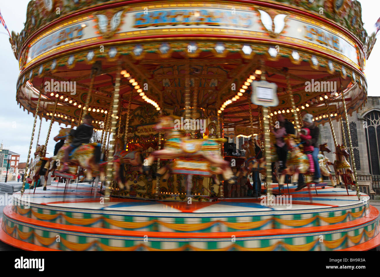 L'orgoglio del sud i cavalli al galoppo giostra ride lavorando in Nowich. Foto Stock