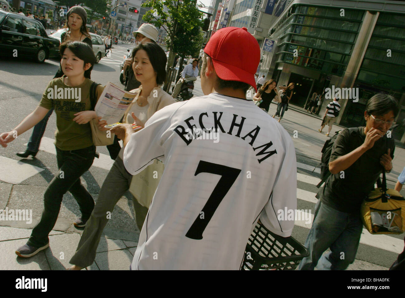 Usura della ventola del Manchester Utd football shirt, a Tokyo, Giappone. Foto Stock