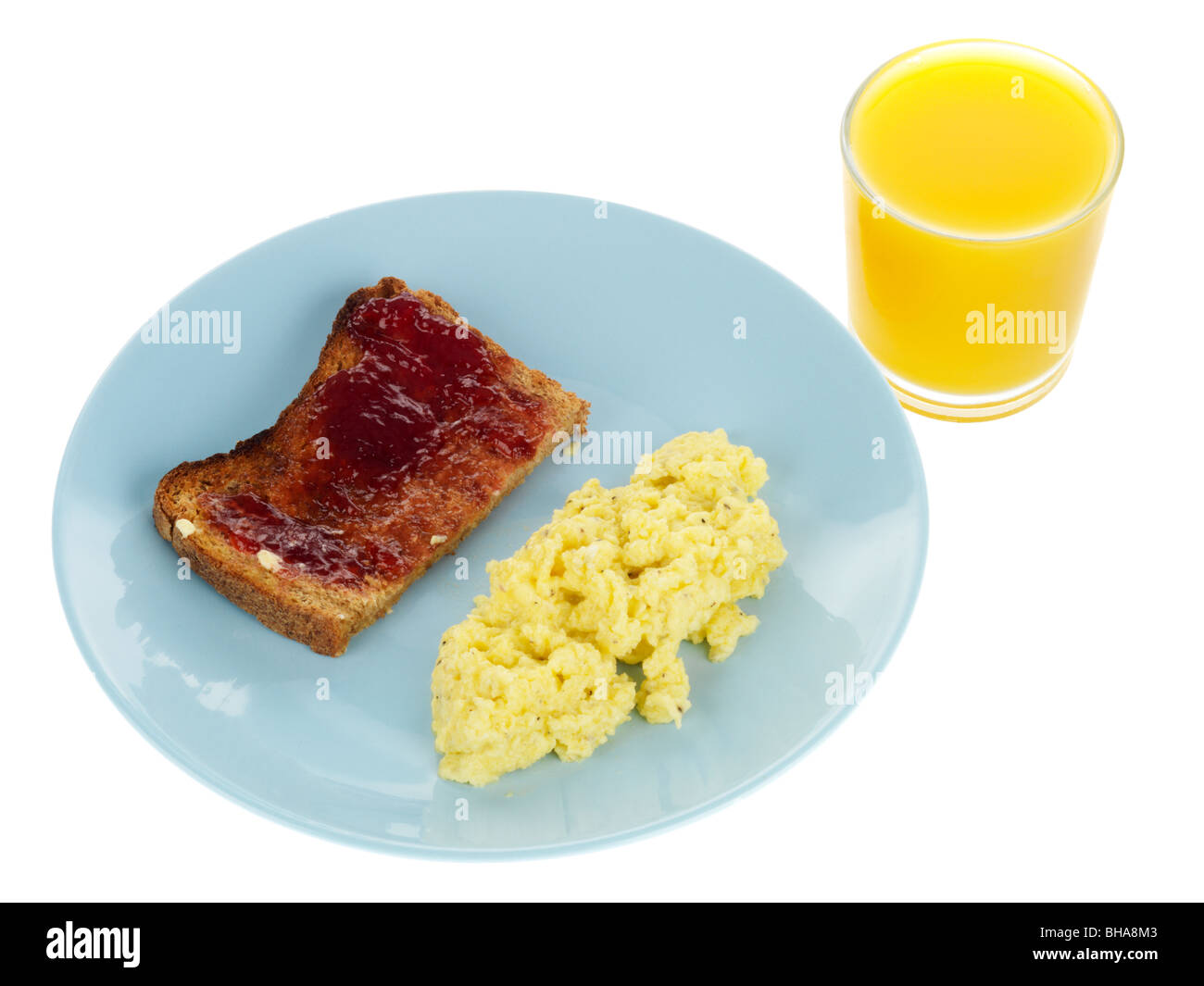Uova strapazzate con marmellata sul pane tostato Foto Stock