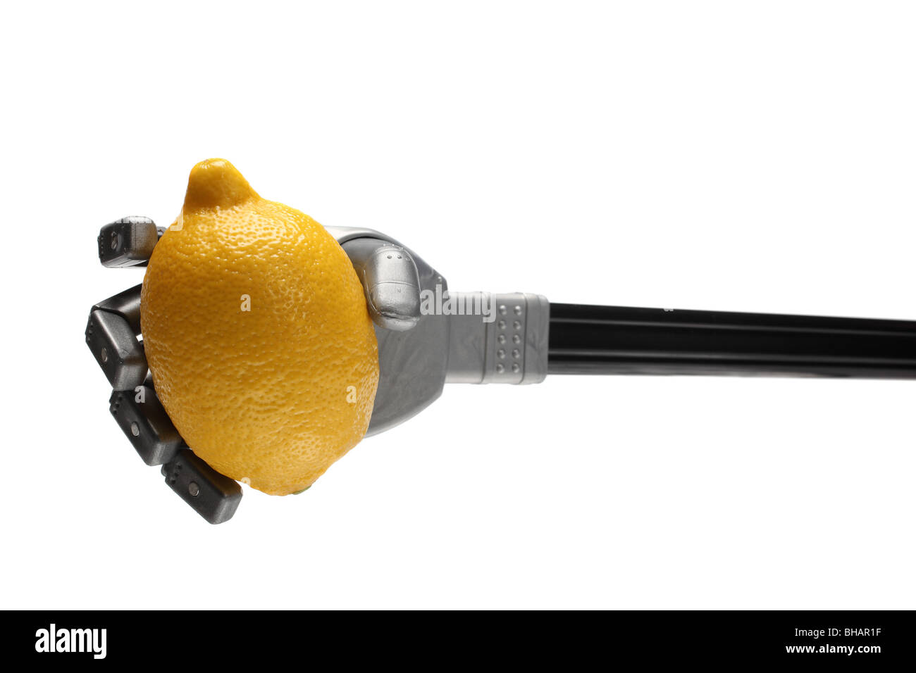 Robot vegetale limone vegetariana veg cibo crudo fame mangiare cibi non cotti prendere mano le dita del braccio tenere il dito tenendo delicato ok Foto Stock