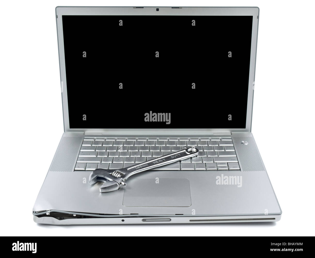 Una chiave su un notebook danneggiati isolate su sfondo bianco. Foto Stock
