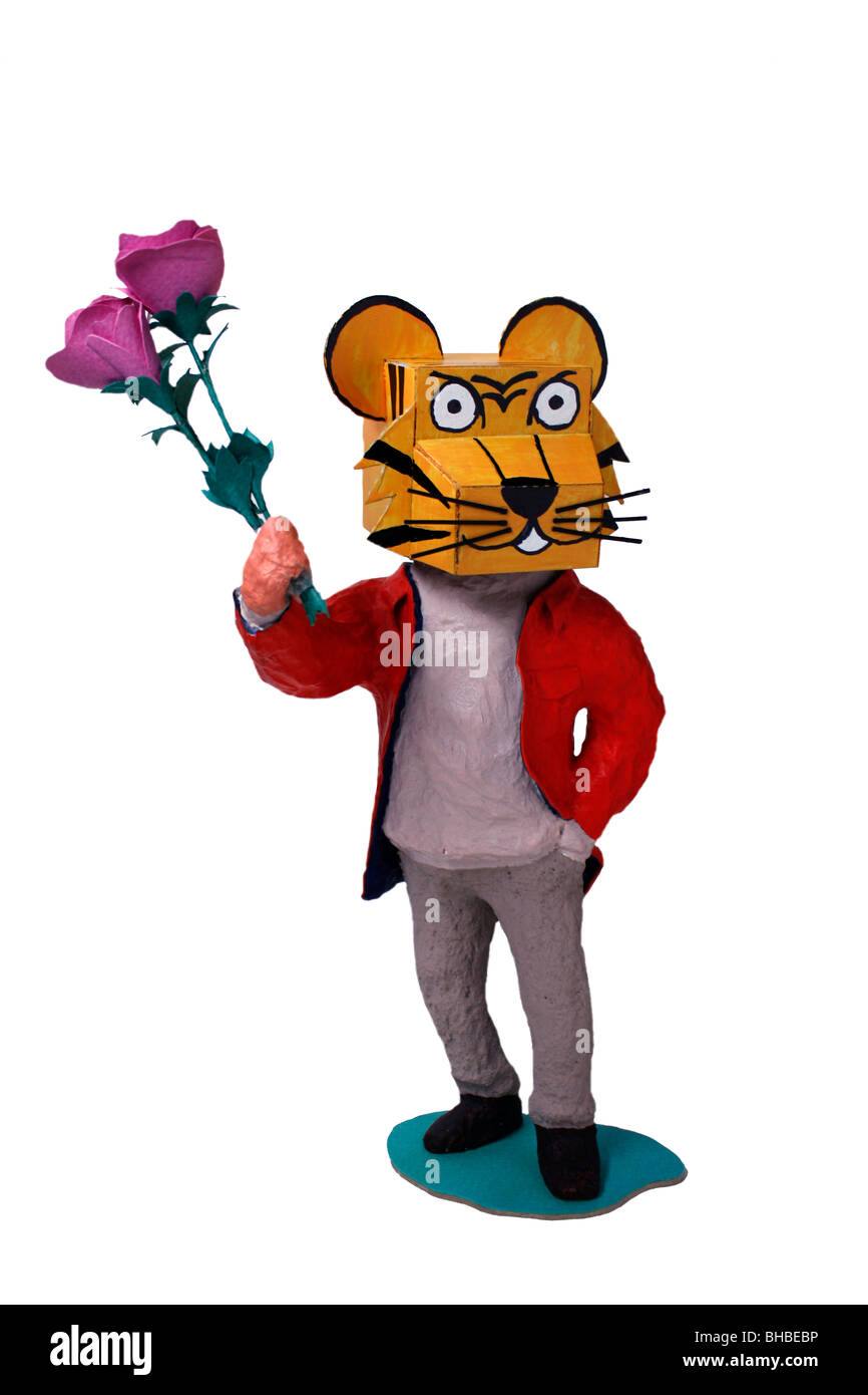 Tiger figurina holding rose fiori Foto Stock