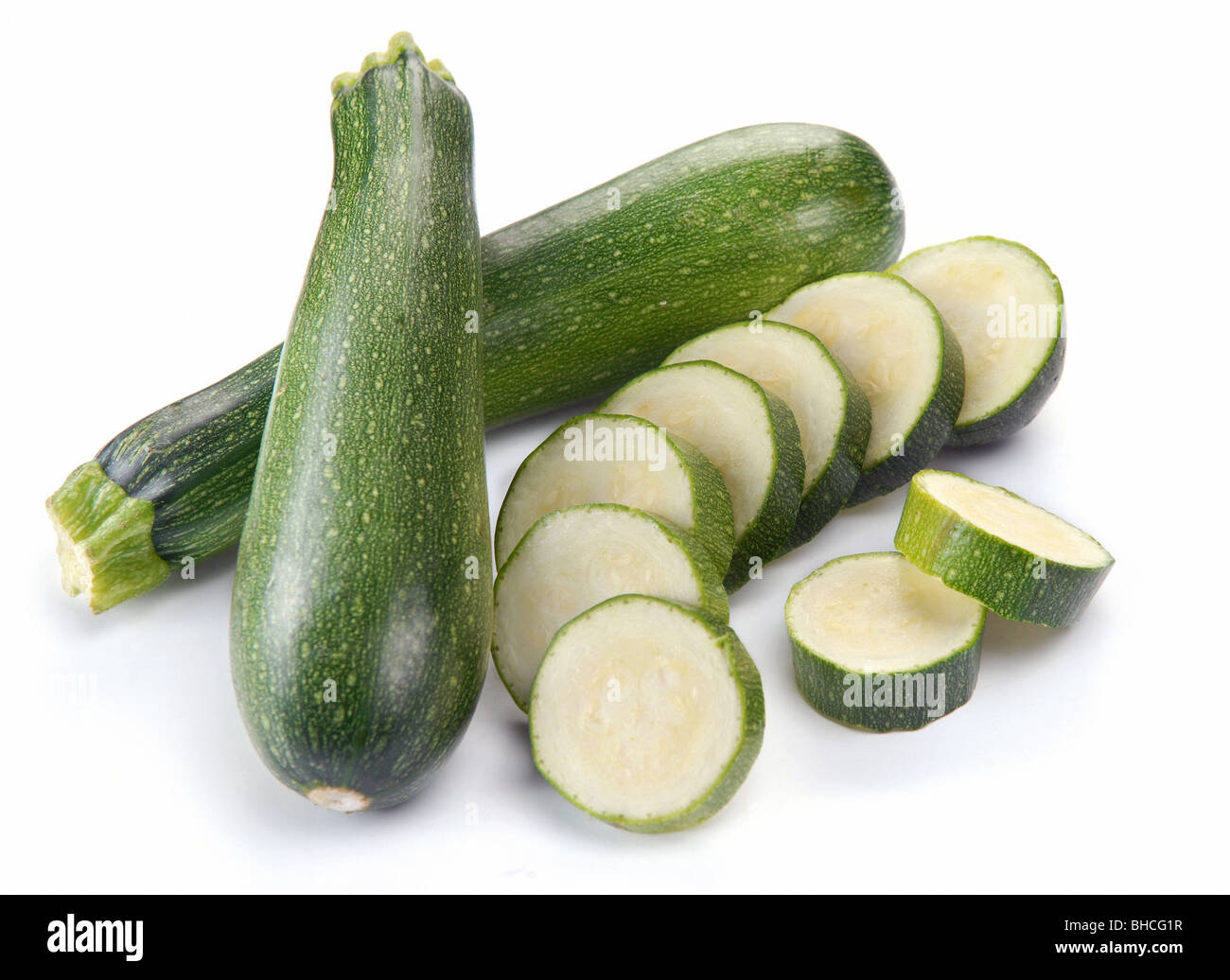 La zucchina su sfondo bianco Foto Stock