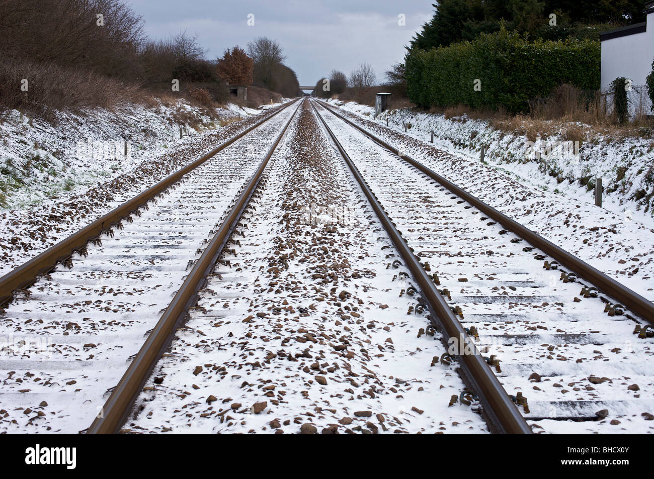 Via treno nella neve Foto Stock