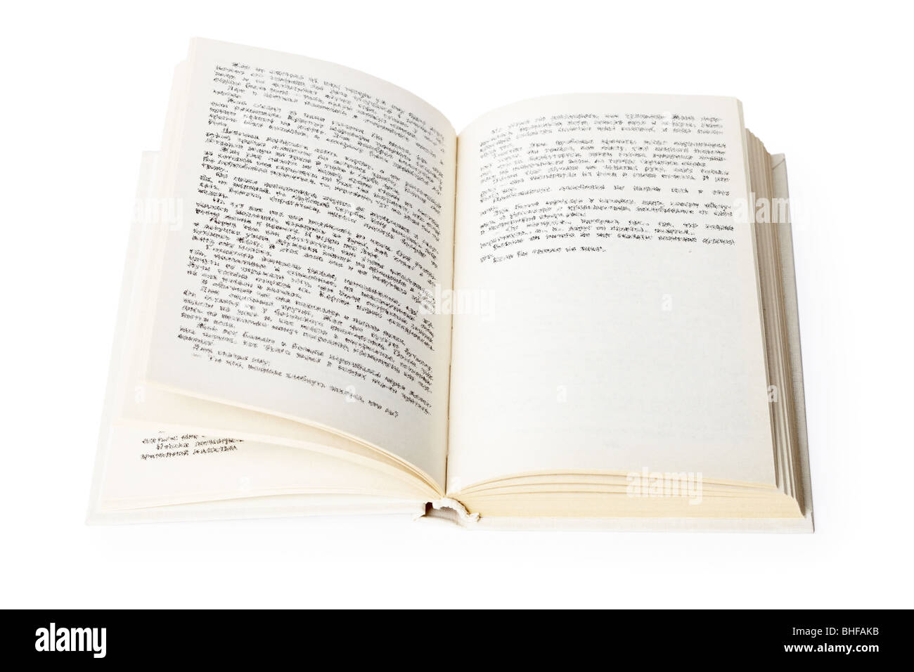 Aprire il libro che giace su un fondo bianco Foto Stock