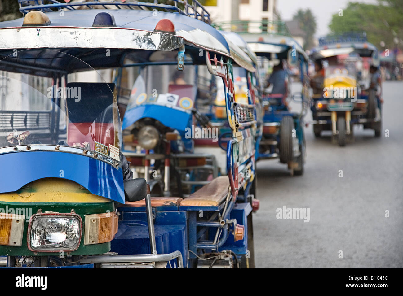 Tuk tuks in Luang Prabang Foto Stock