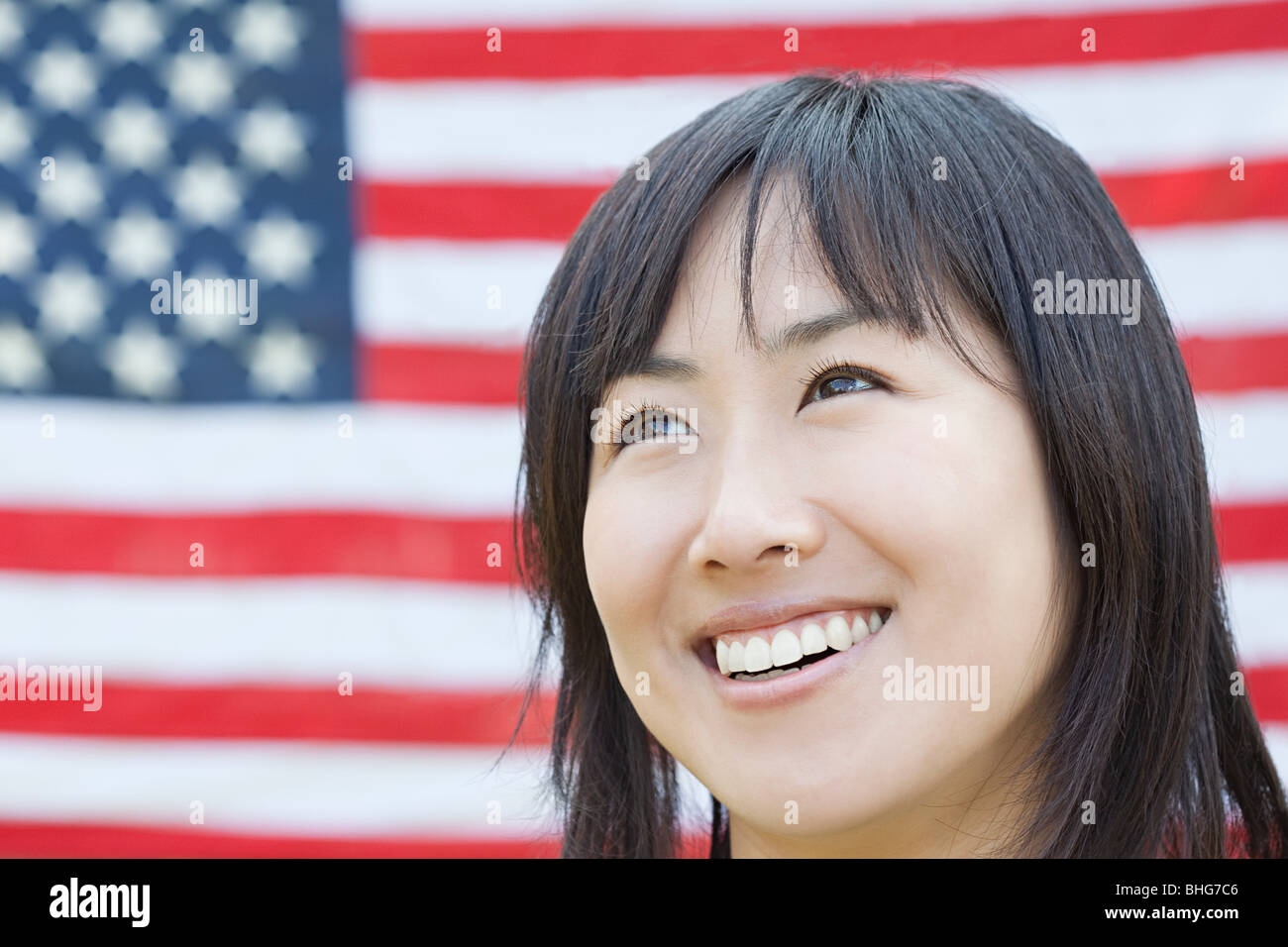 Donna e bandiera americana Foto Stock