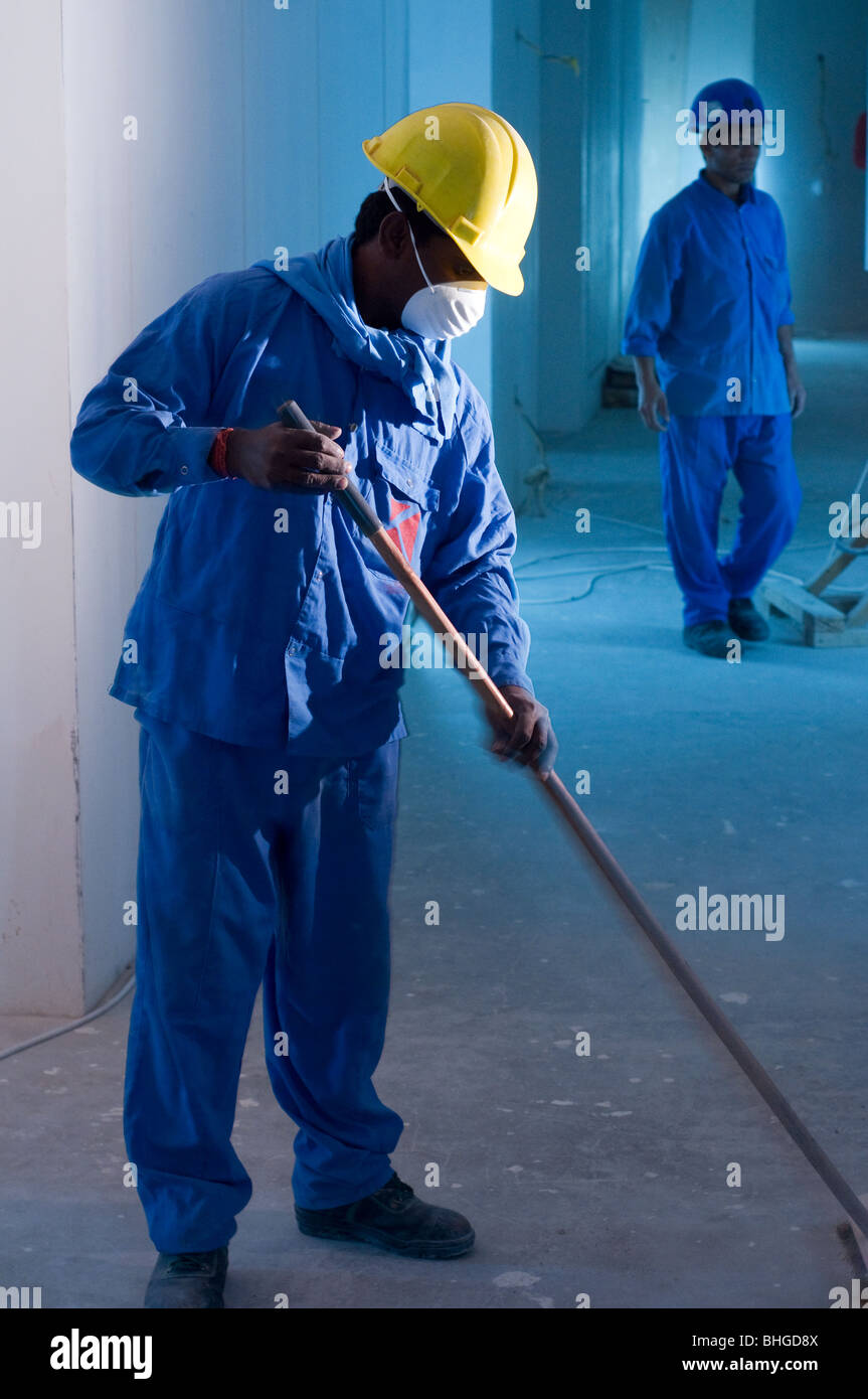 Lavoratori edili sul sito in Dubai EMIRATI ARABI UNITI Foto Stock