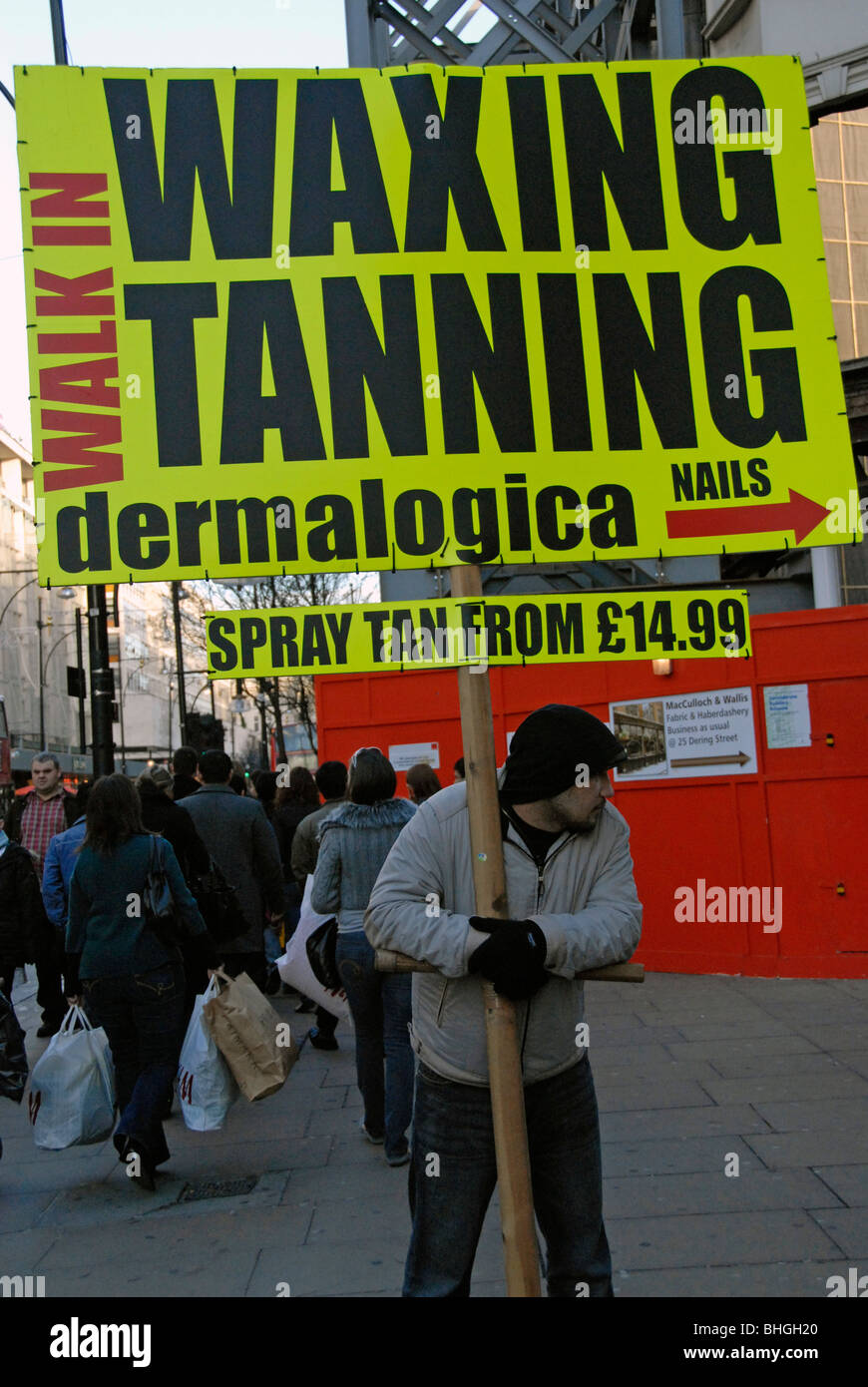 Uomo con pannello pubblicitario in Oxford Street Foto Stock Uomo con pannello pubblicitario in Oxford Street Foto Stock