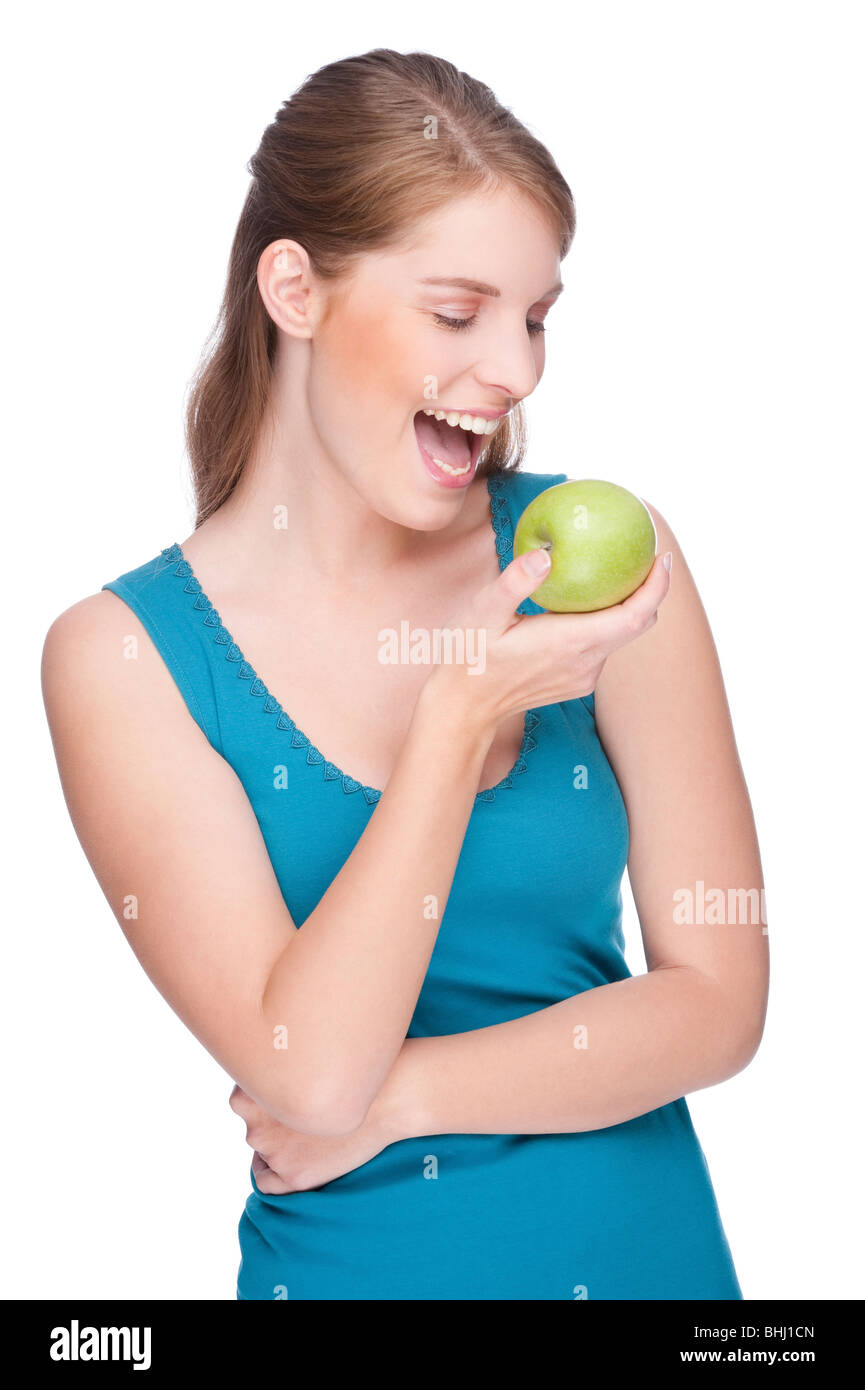 Piena isolati studio immagine da una giovane donna con un Apple Foto Stock