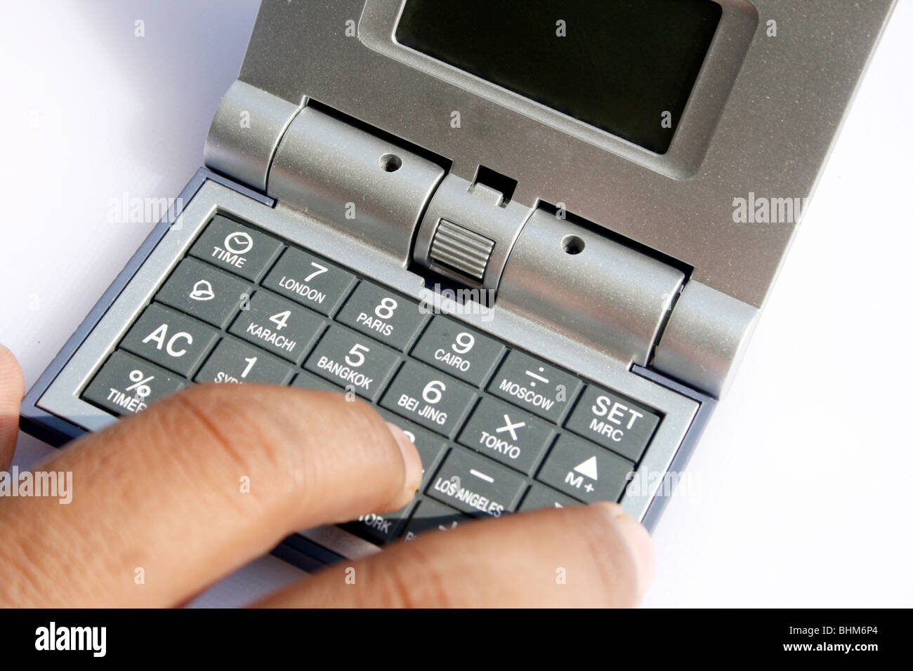 Lavorando con la calcolatrice Foto Stock