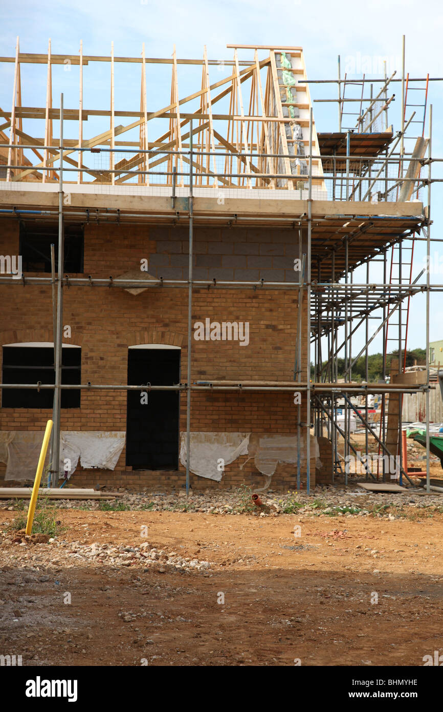 Nuova casa in costruzione su un sito di costruzione Foto Stock