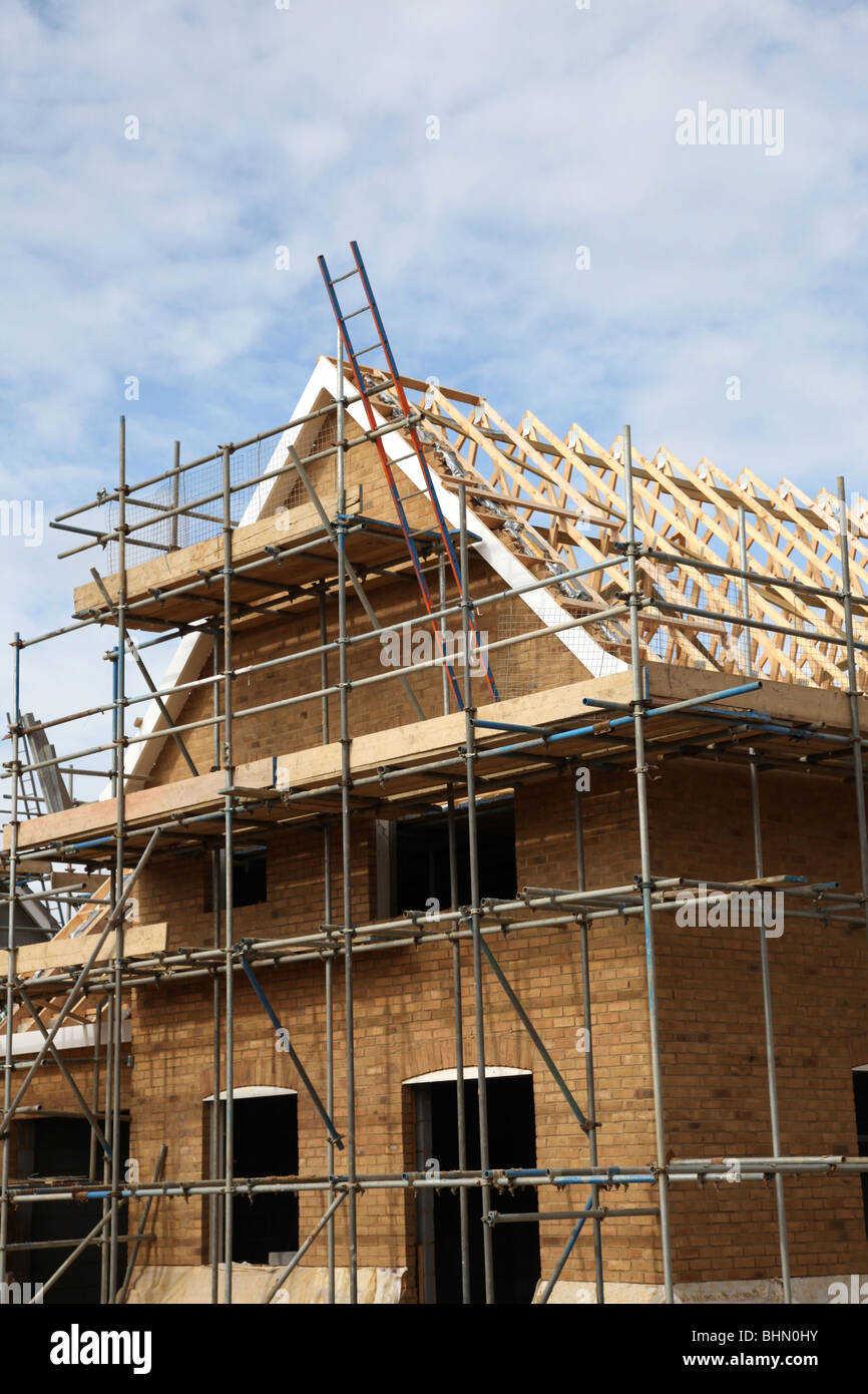 Nuova casa sotto constuction su un sito di costruzione Foto Stock