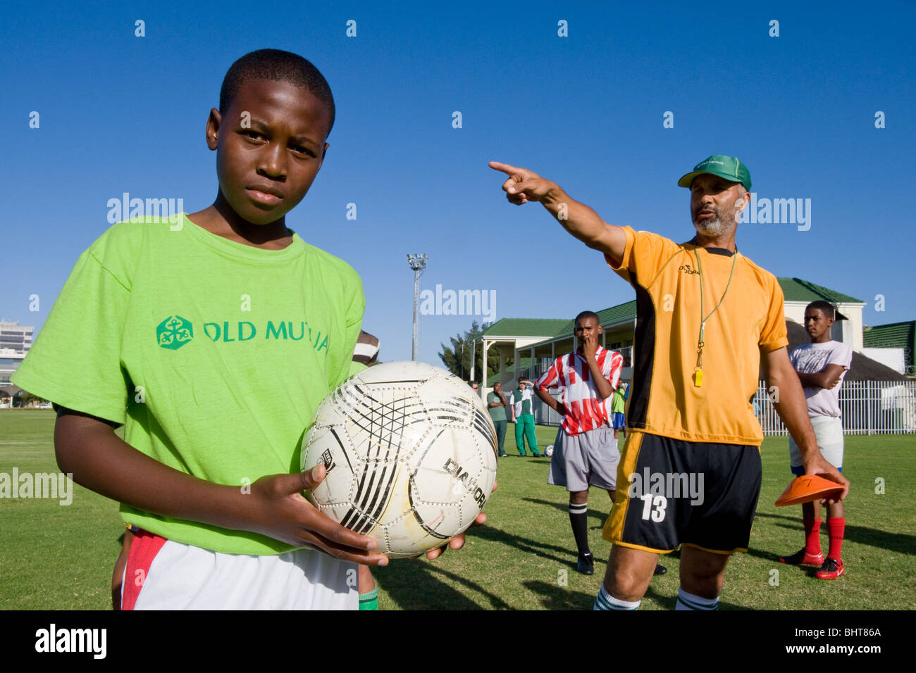 Pullman di istruire i giocatori di Old Mutual Accademia di calcio, Cape Town, Sud Africa Foto Stock