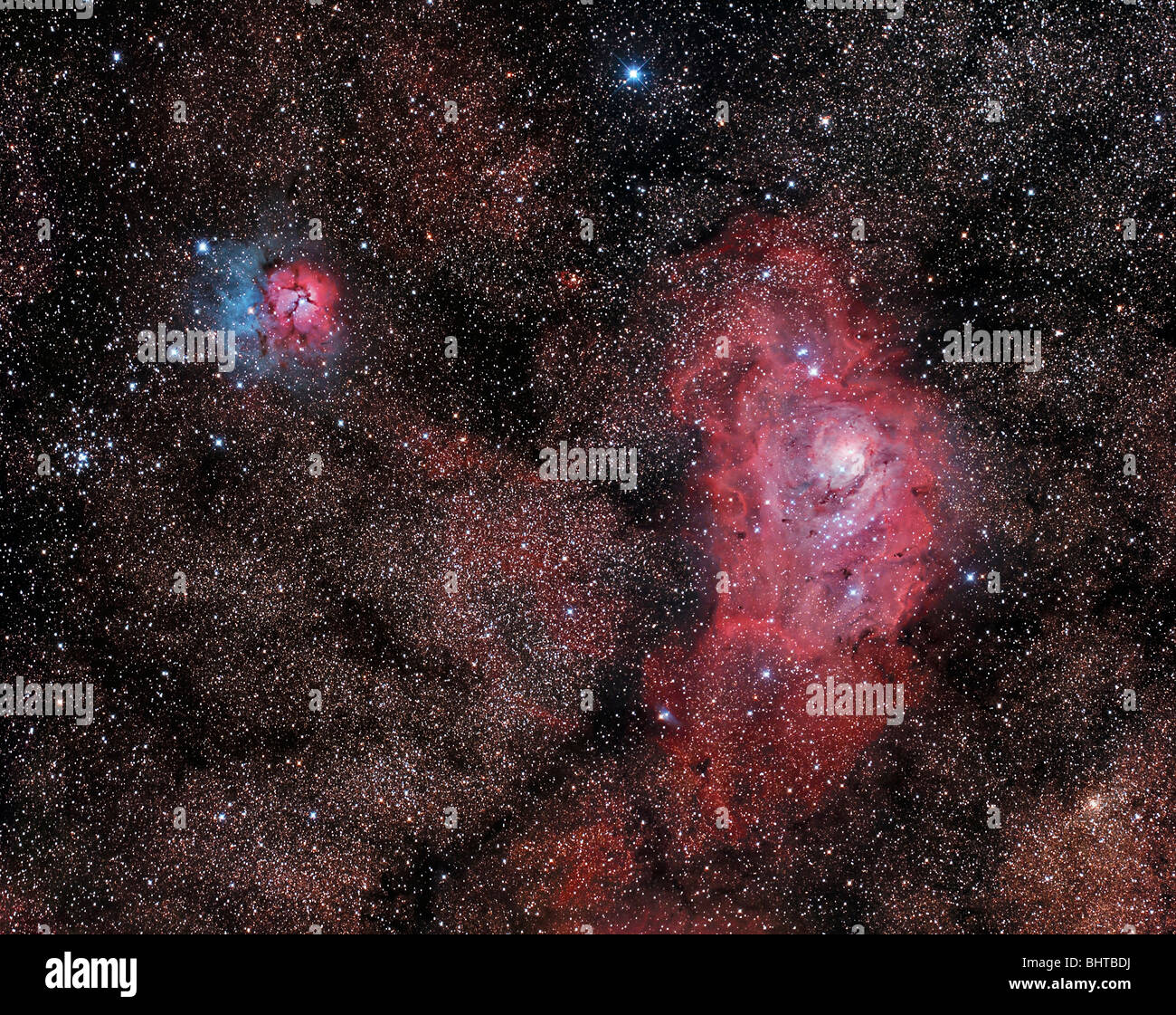 La Nebulosa Laguna e Trifid Nebula in Sagittario. Foto Stock