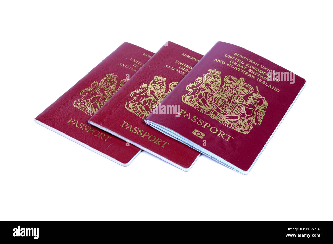 Tre Unione Europea Regno Unito di Gran Bretagna e Irlanda del Nord di passaporti contro uno sfondo bianco Foto Stock