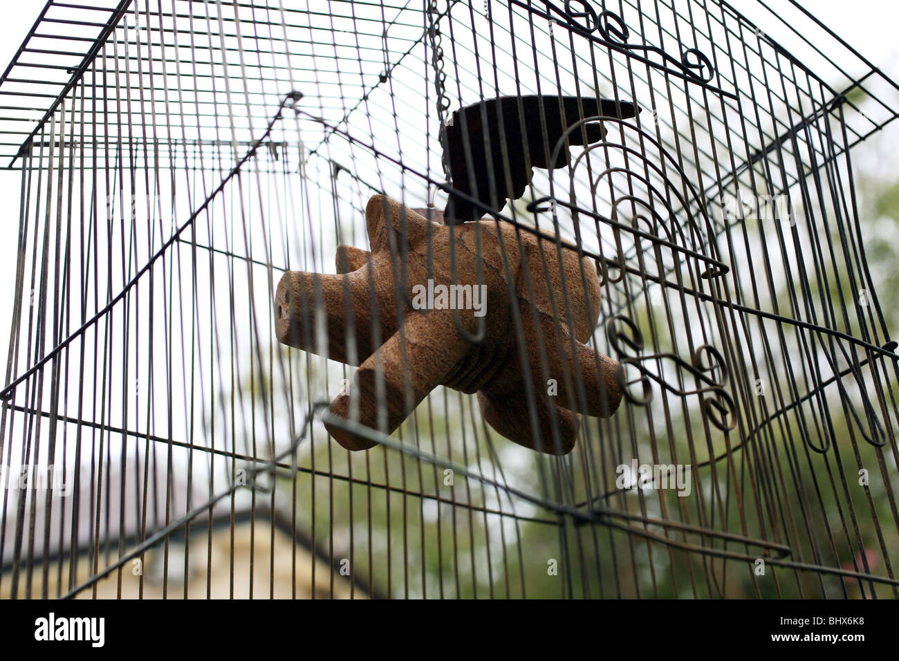 Flying Pig intrappolato in una gabbia Foto Stock