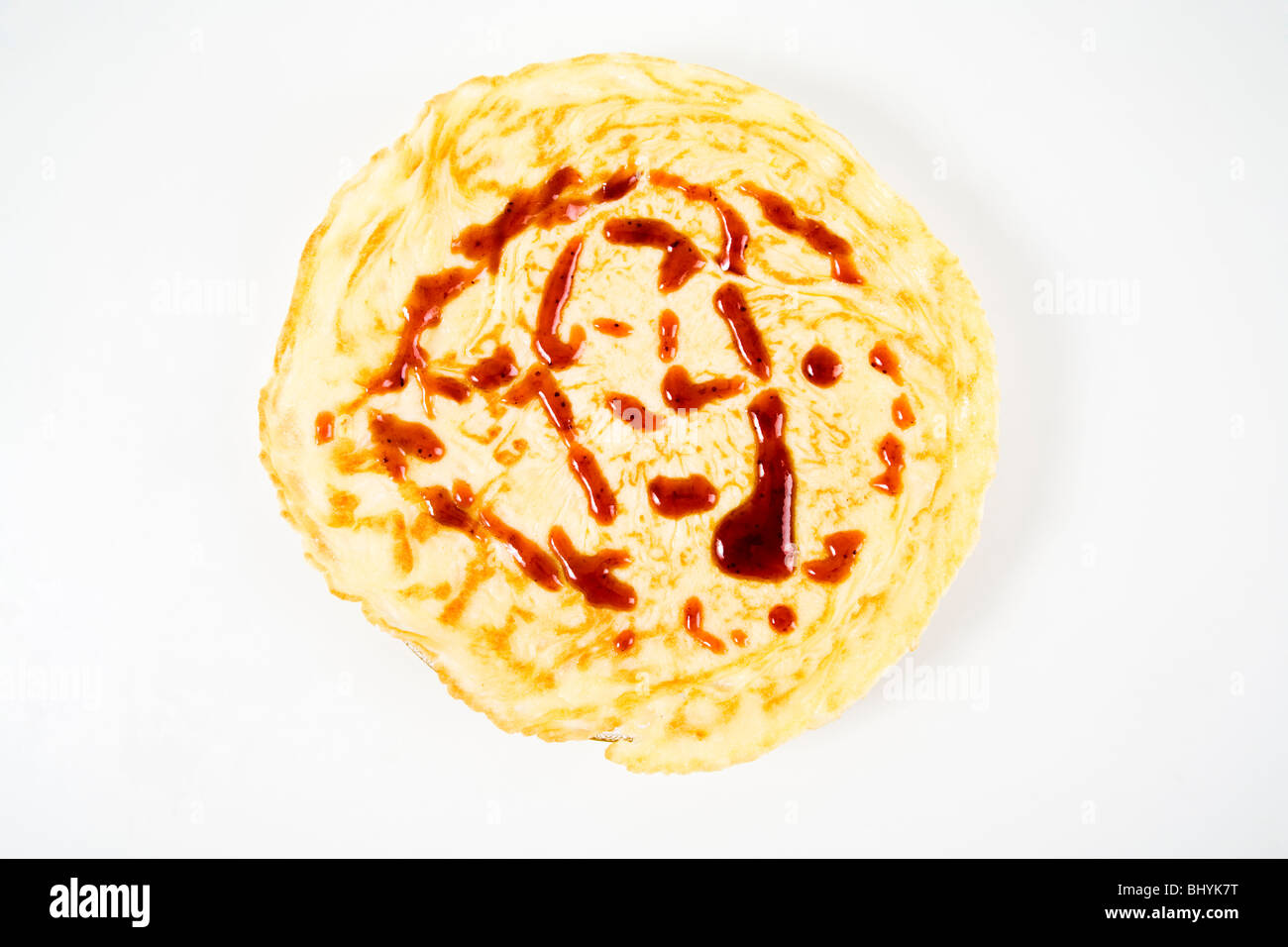Pancake con la marmellata su una piastra Foto Stock