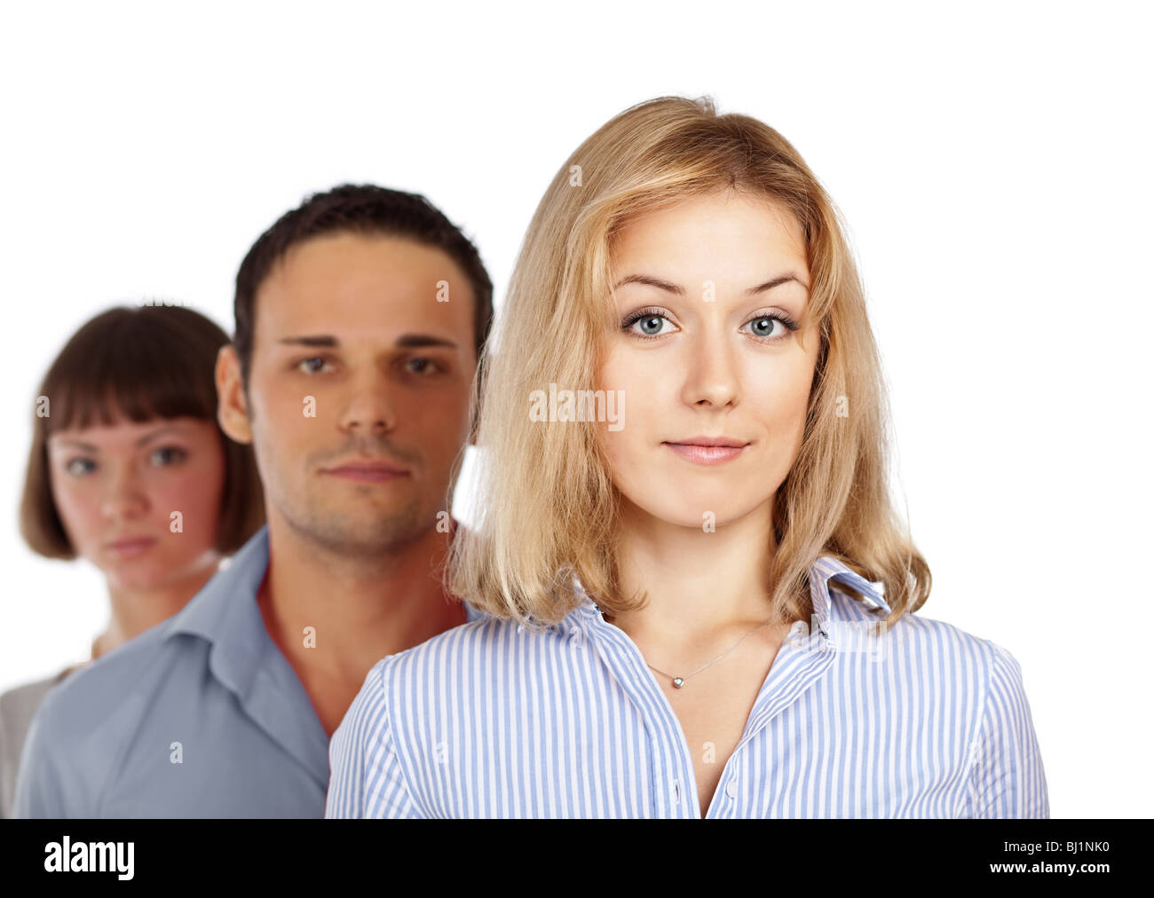 Il team Aziende di tre colleghi; il fuoco selettivo (solo donna in primo piano è a fuoco) Foto Stock