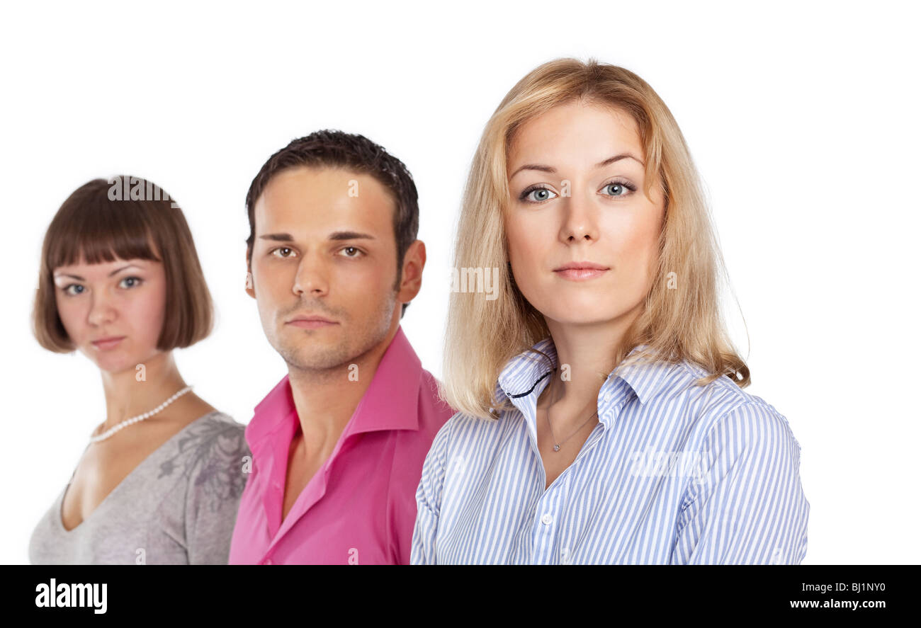 Il team Aziende di tre colleghi; il fuoco selettivo (solo donna in primo piano è a fuoco) Foto Stock