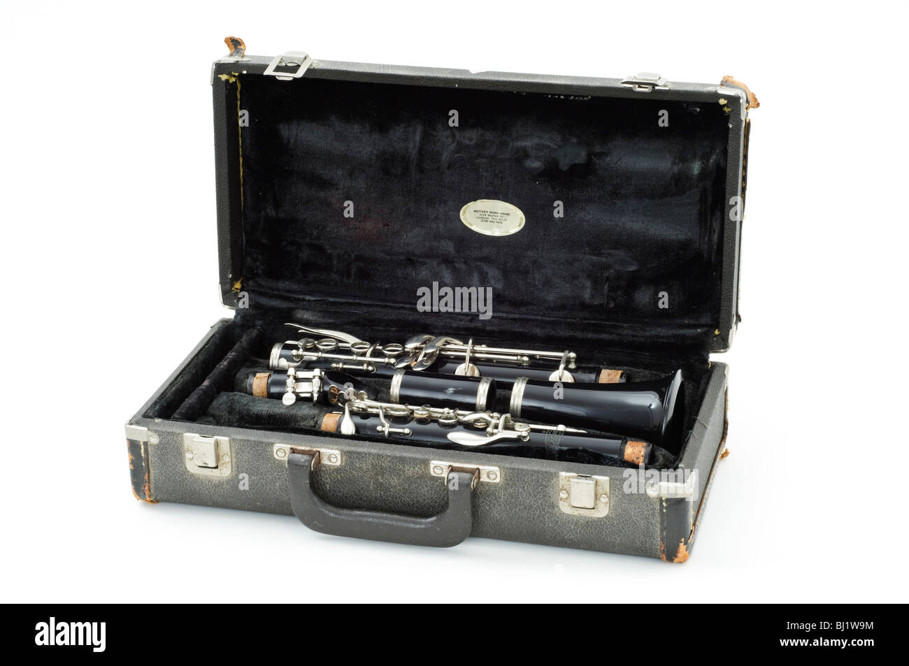 Vecchio clarinetto in beat up case Foto Stock