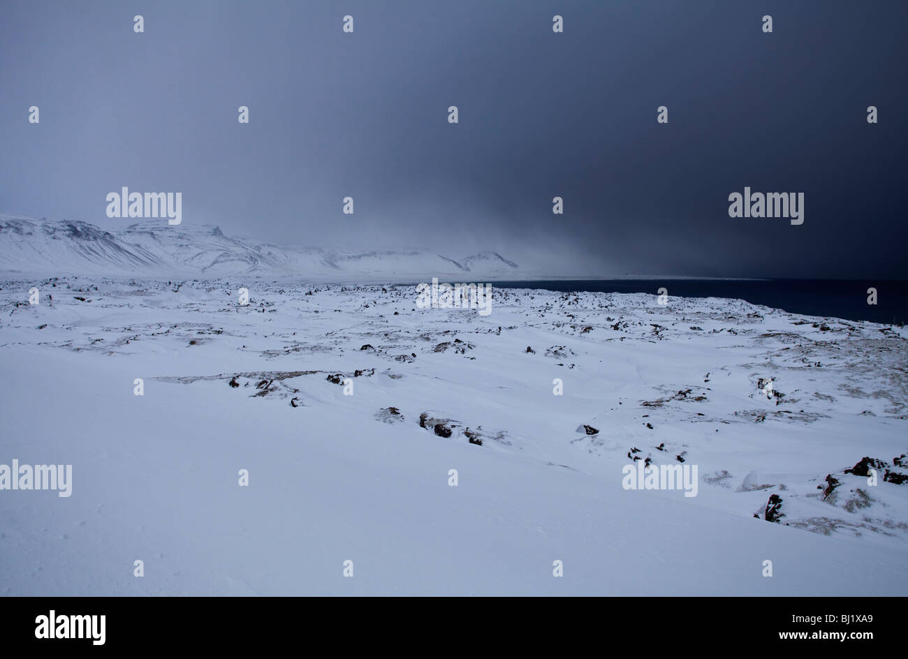 Lava, coperto di neve, Snaefellsnes, Islanda Foto Stock