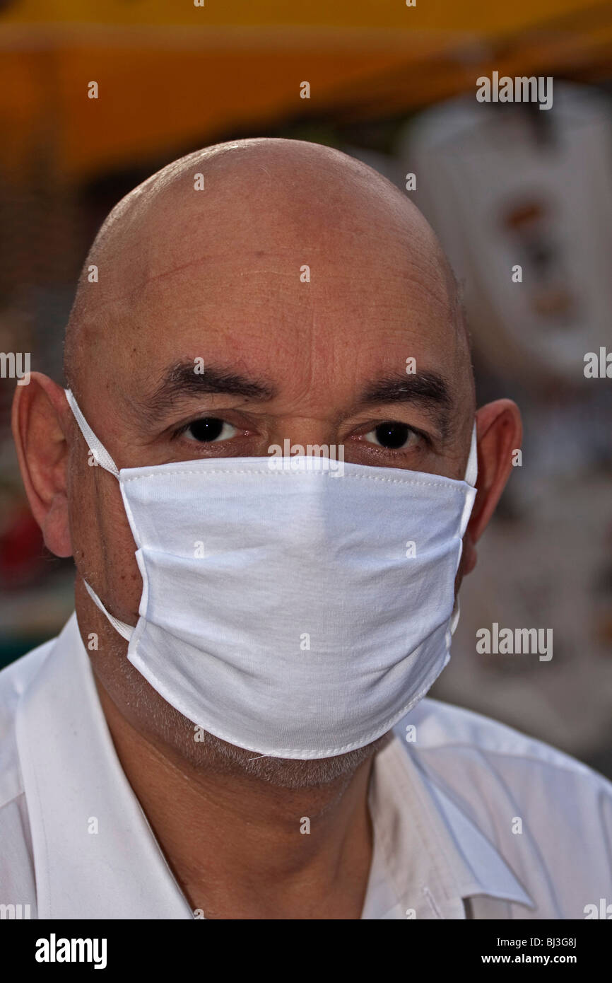 Medico con la maschera per il viso Foto Stock