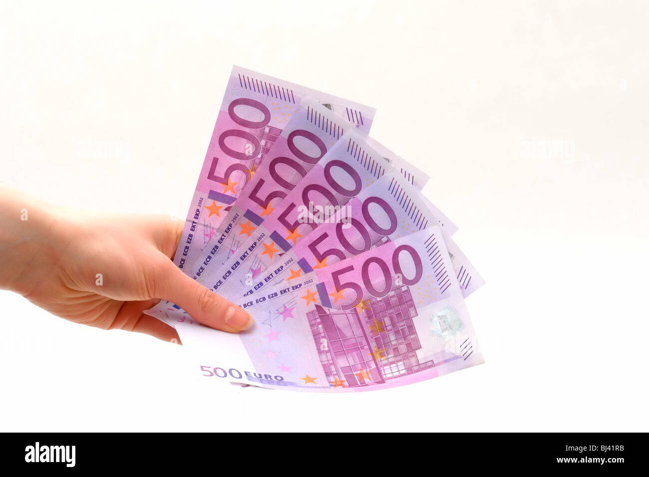 Mano che trattiene le banconote Foto Stock