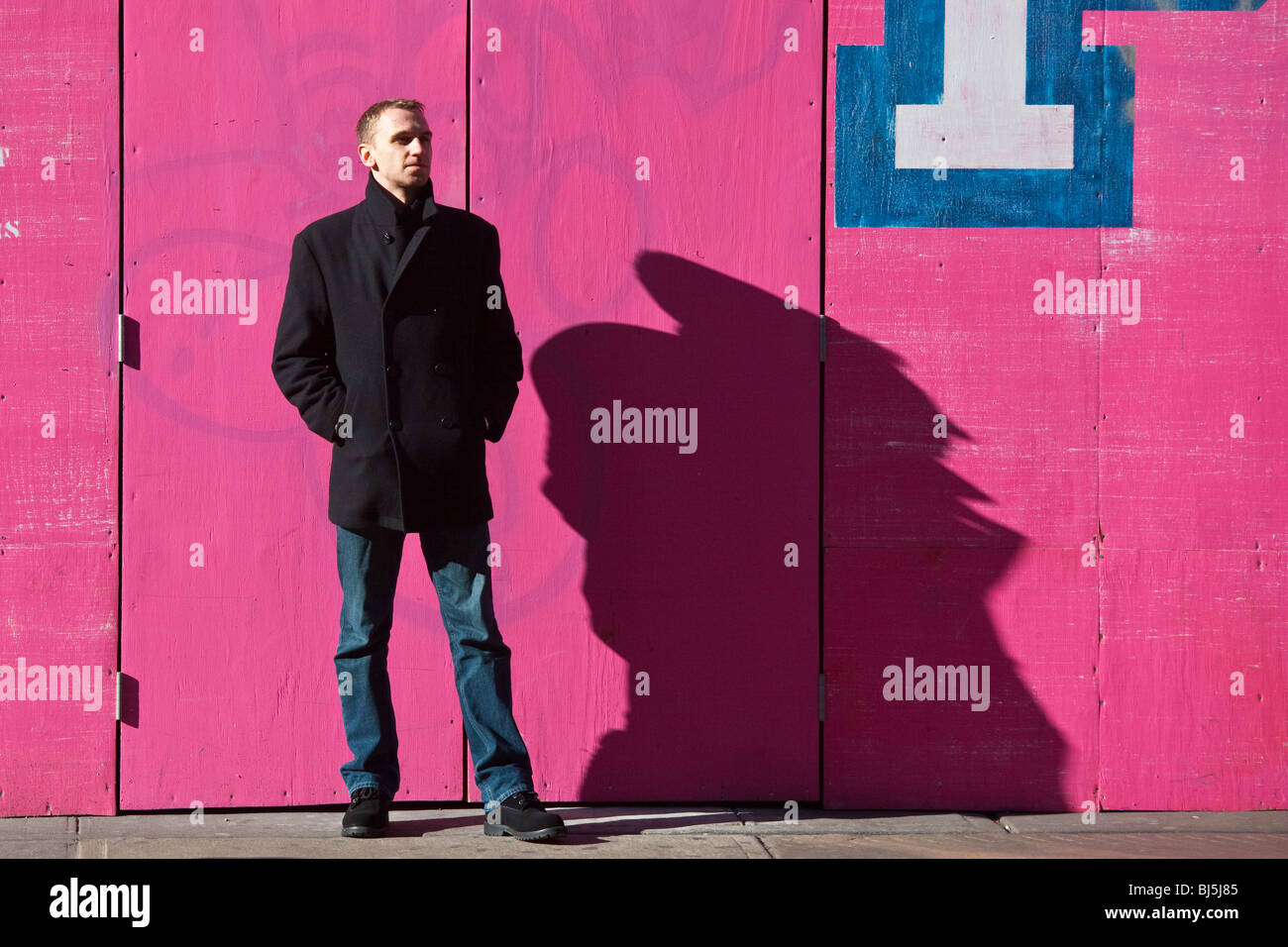 Uomo in Soho di New York City Foto Stock