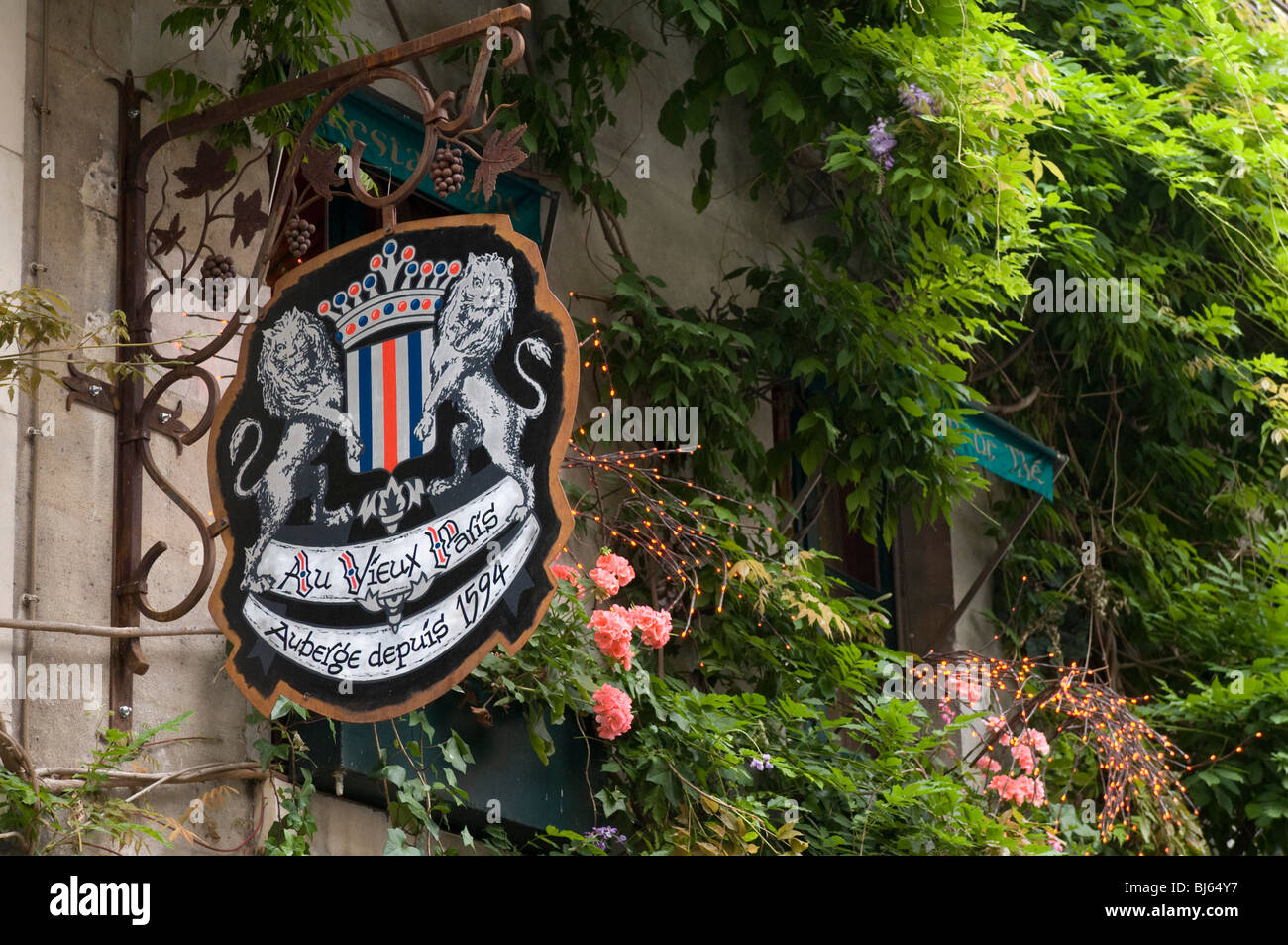 Ristorante segno, Rue Chanoinesse, Ile de la Cité, Parigi, Francia. Foto Stock